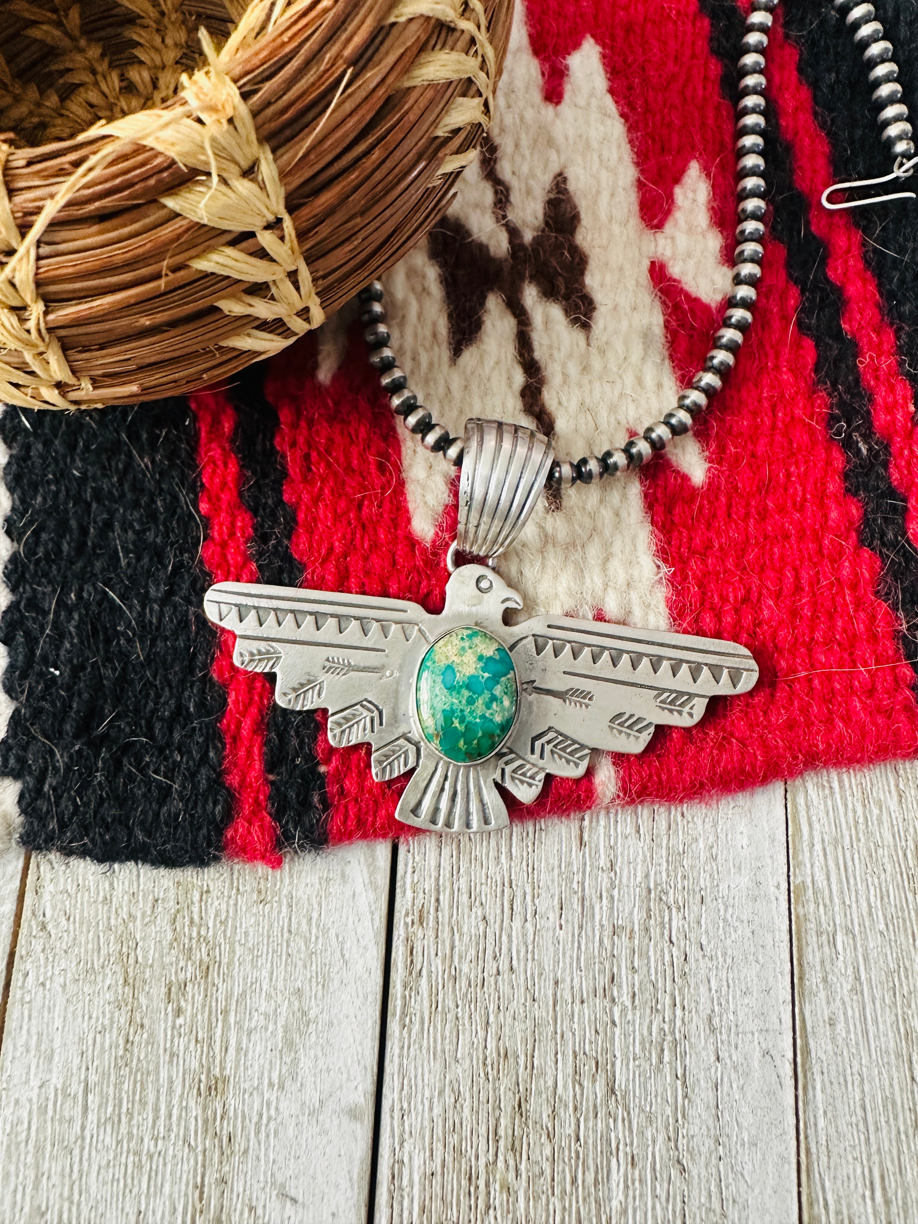 Sterling Silver & Turquoise Thunderbird Pendant by Russell Sam