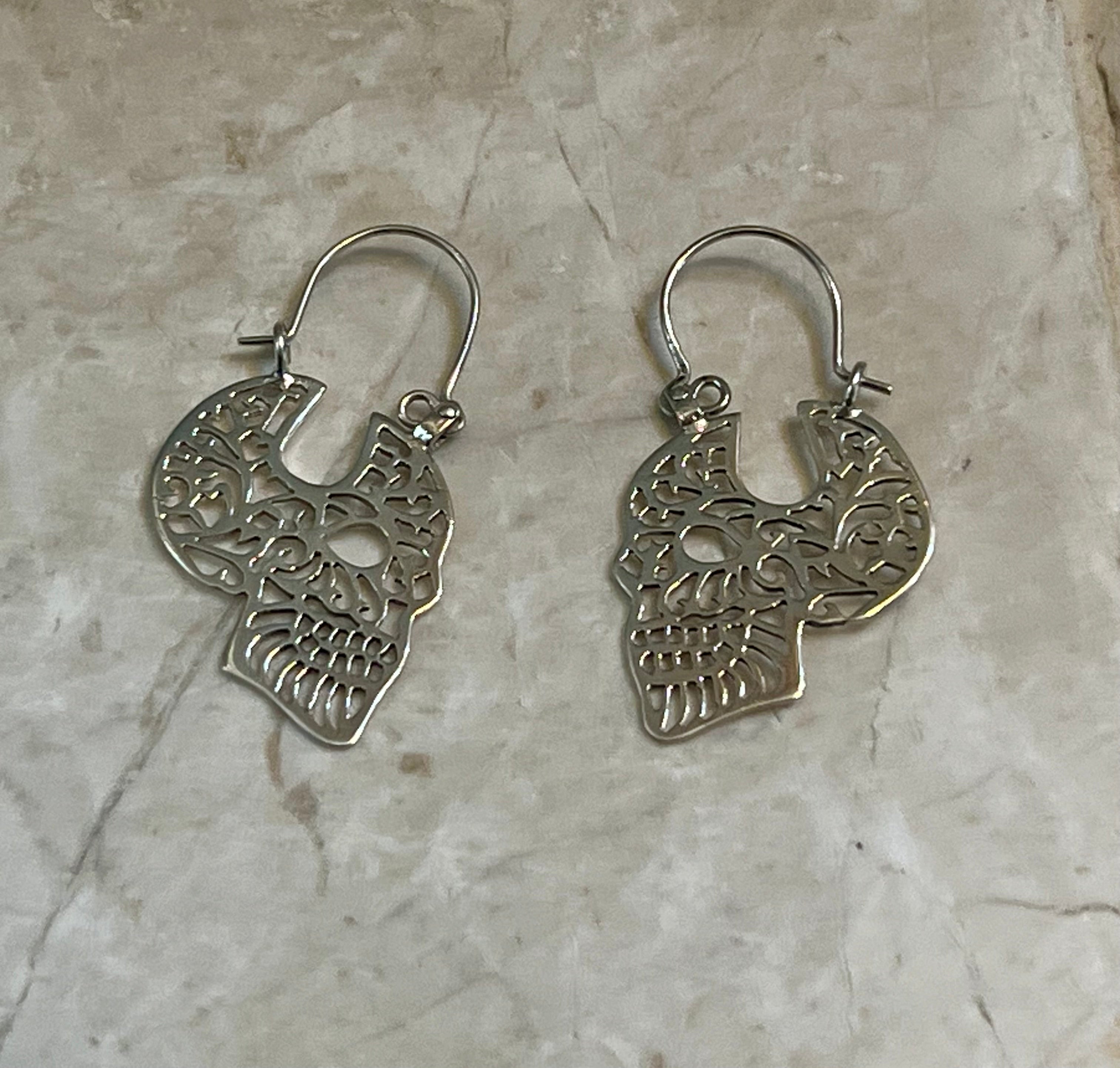 Pierced Skull Profile Sterling Silver Earrings
