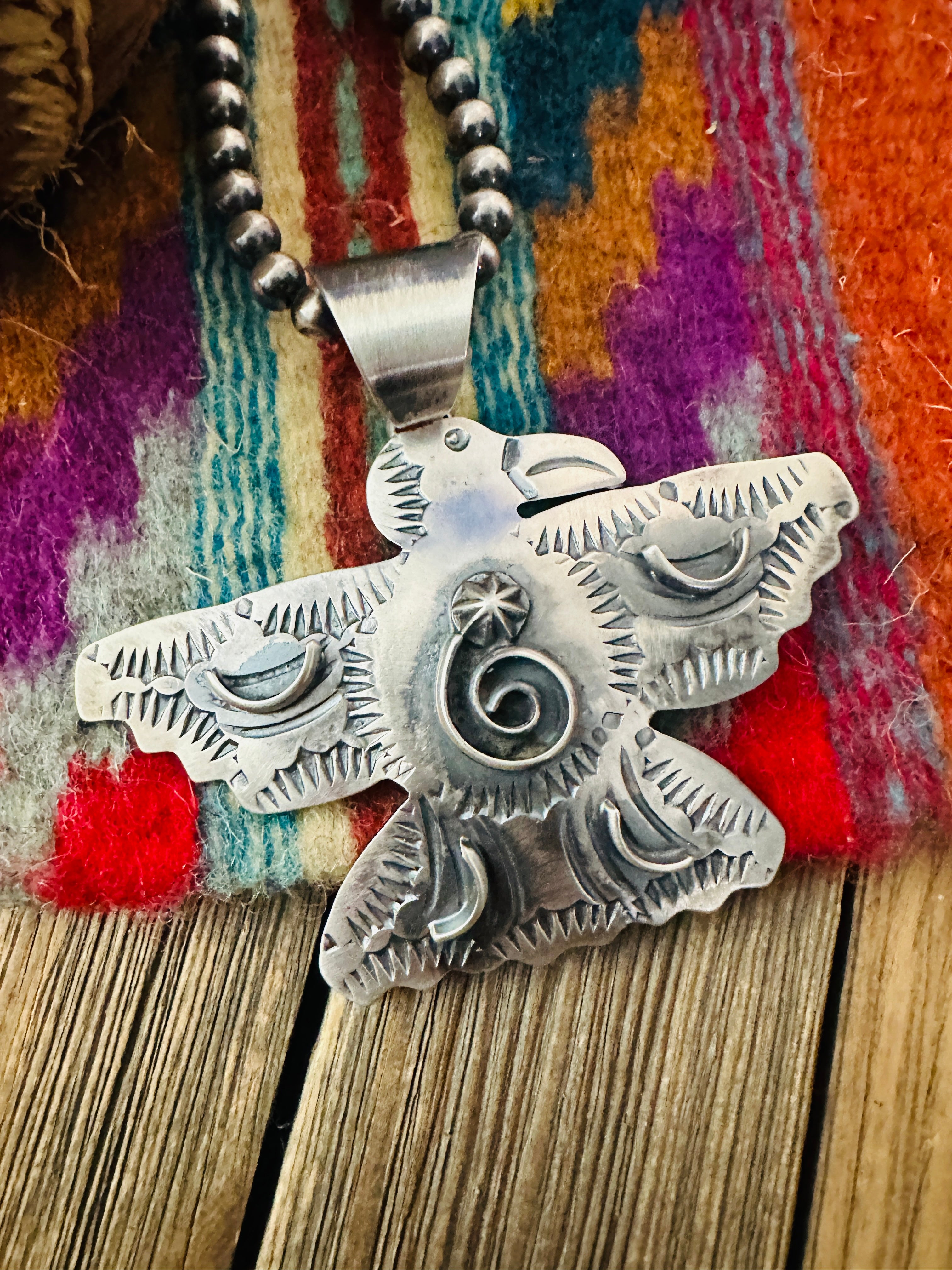 Handcrafted Sterling Silver Thunderbird Pendant by Chimney Butte
