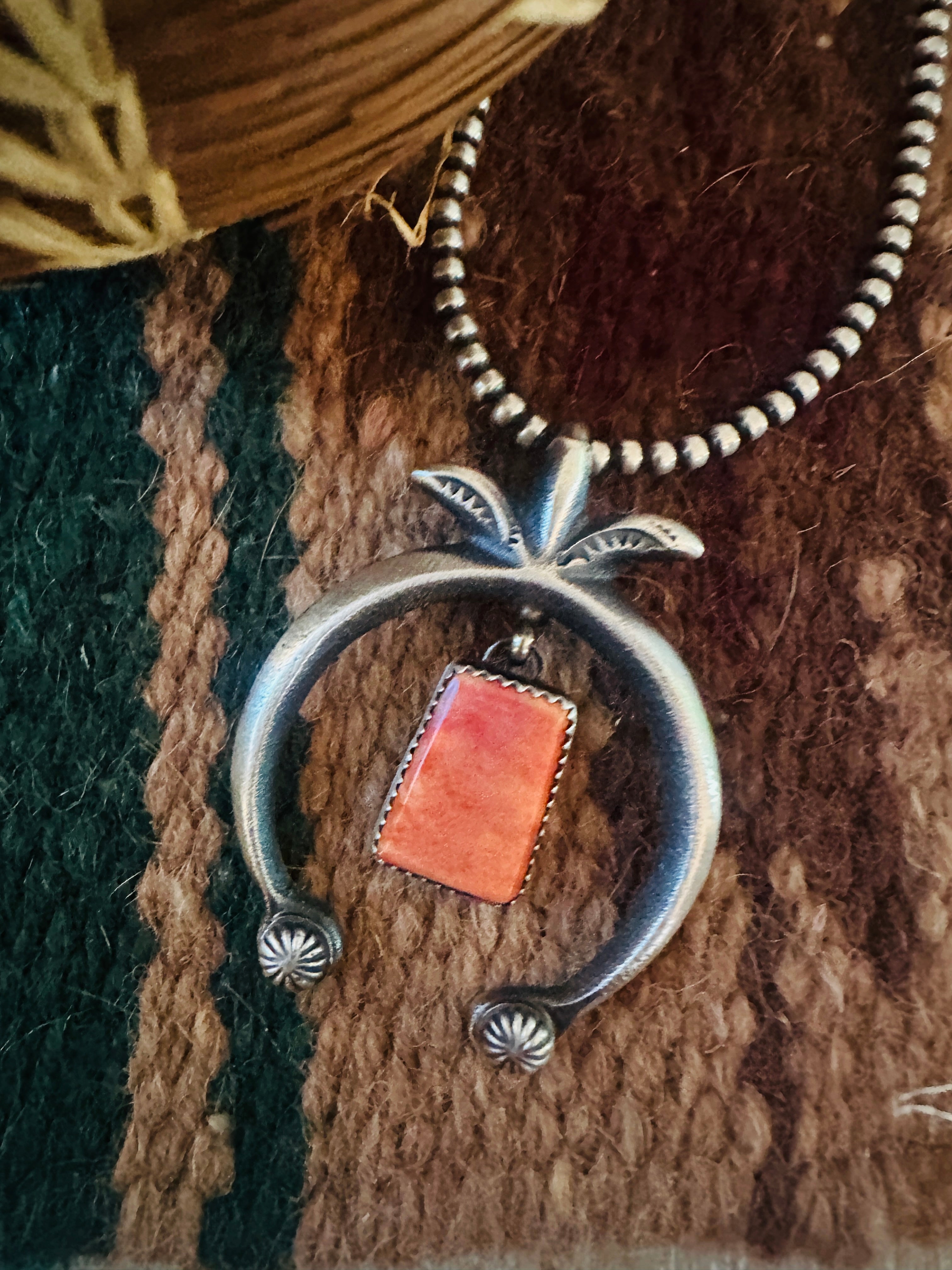Handcrafted Sterling Silver & Orange Spiny Naja Pendant by Martha Cayatineto