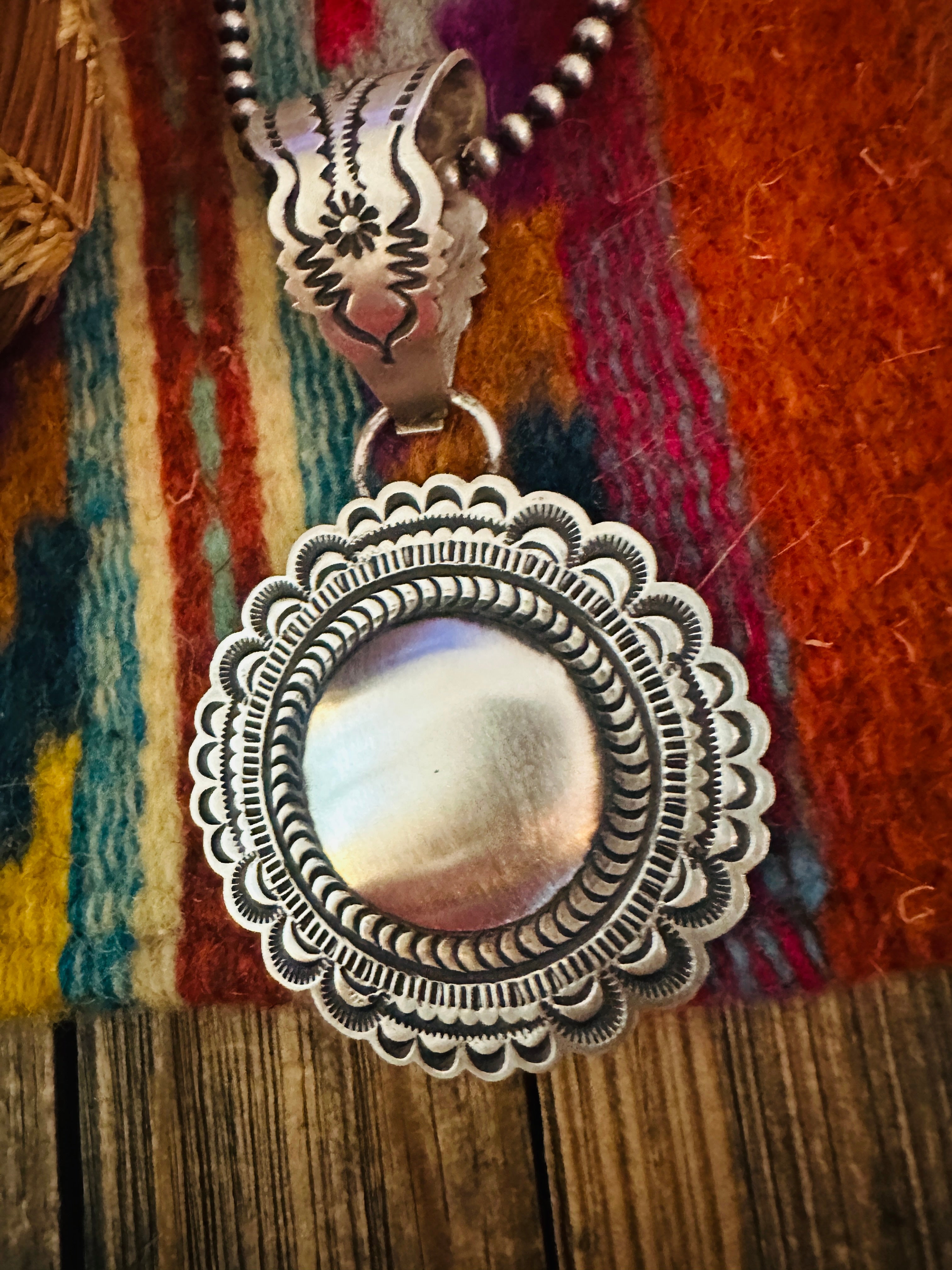 Handcrafted Sterling Silver Concho Pendant by Leander Tahe