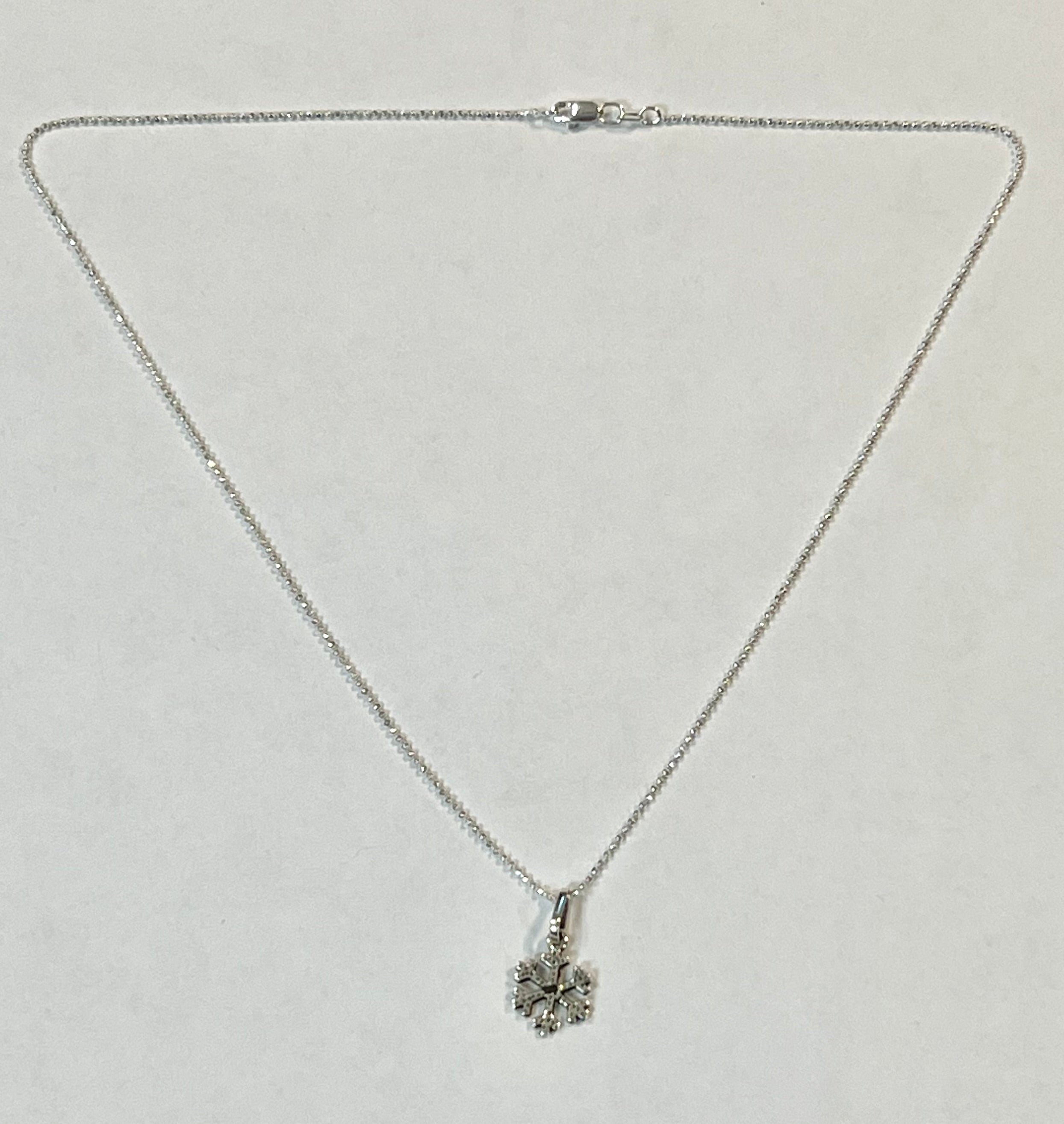 Small Sterling Silver Snowflake Pendant Necklace