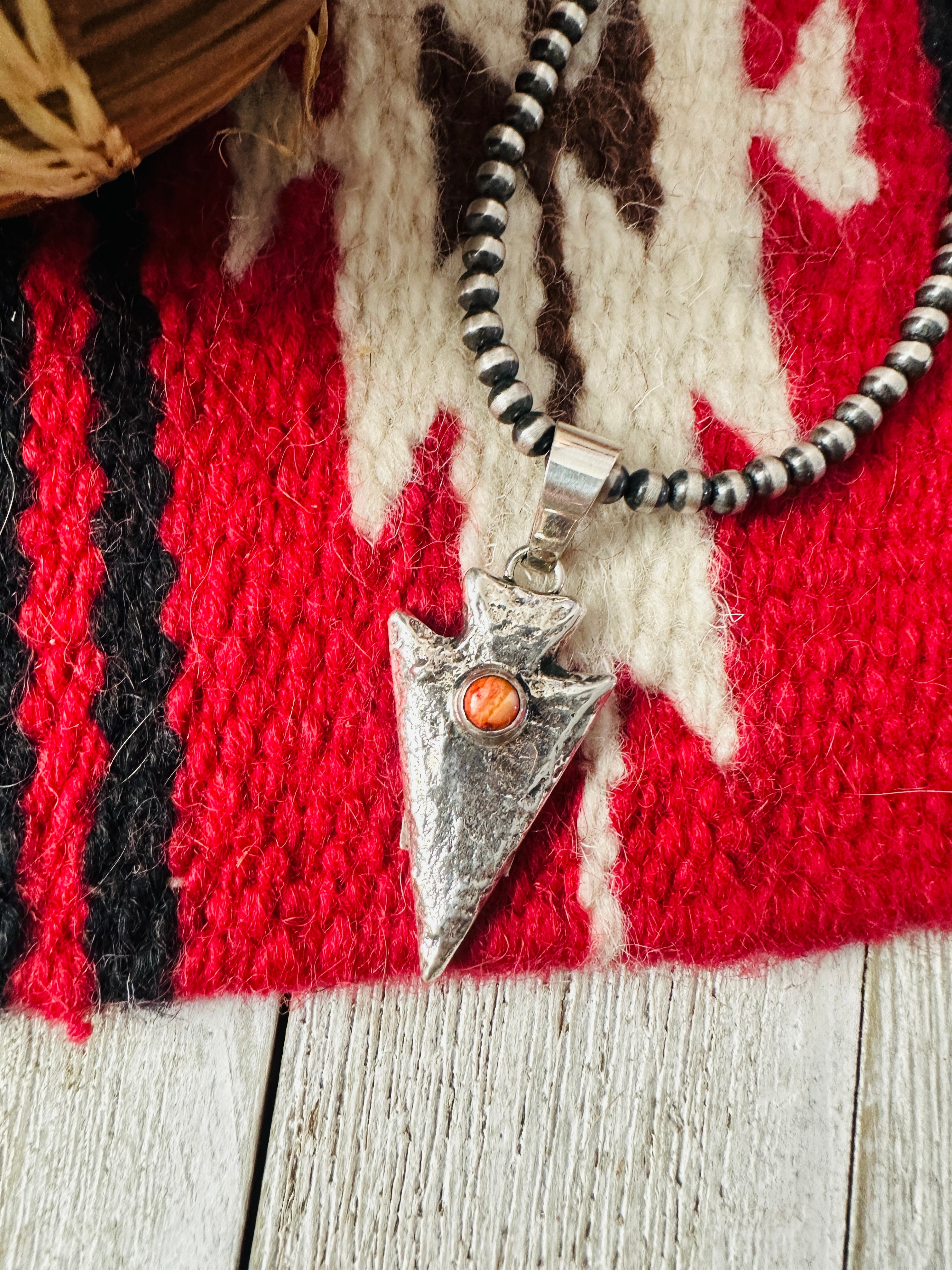Handcrafted Sterling Silver and Orange Spiny Arrowhead Pendant by Charles Johnson