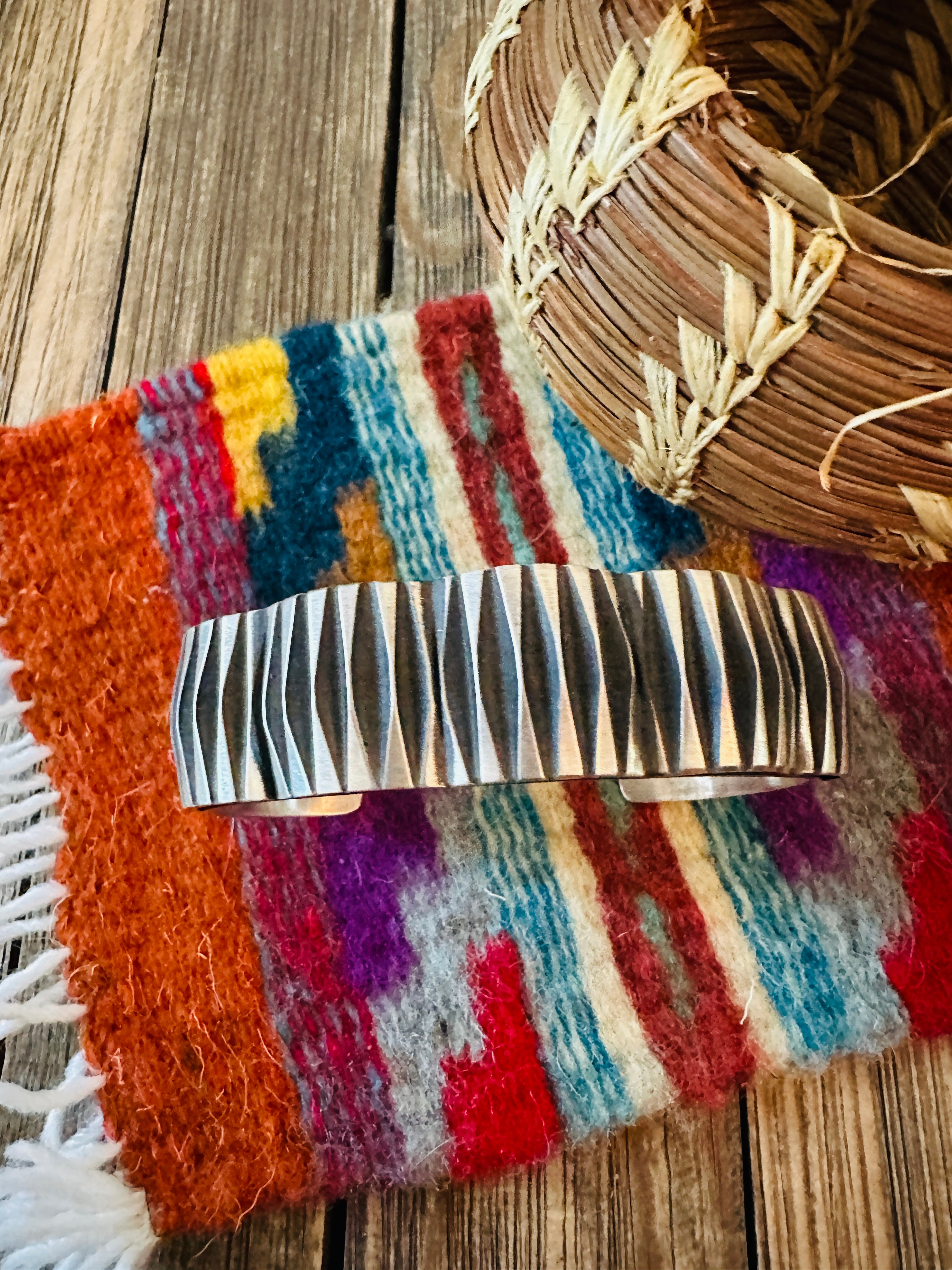 Hand Stamped Sterling Silver Cuff Bracelet by Leander Tahe