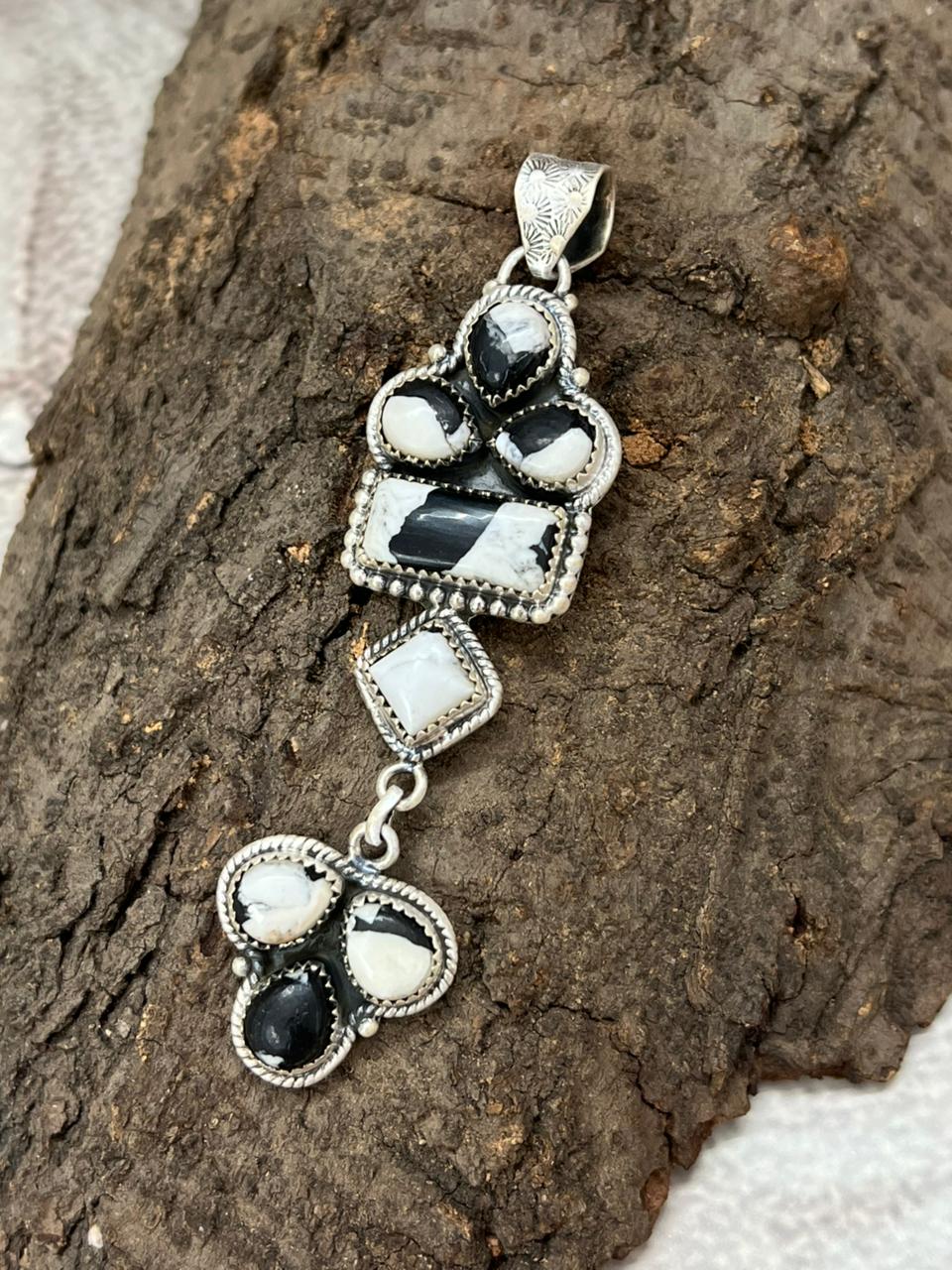 Handmade Sterling Silver White Buffalo Pendant with Signed Nizhoni