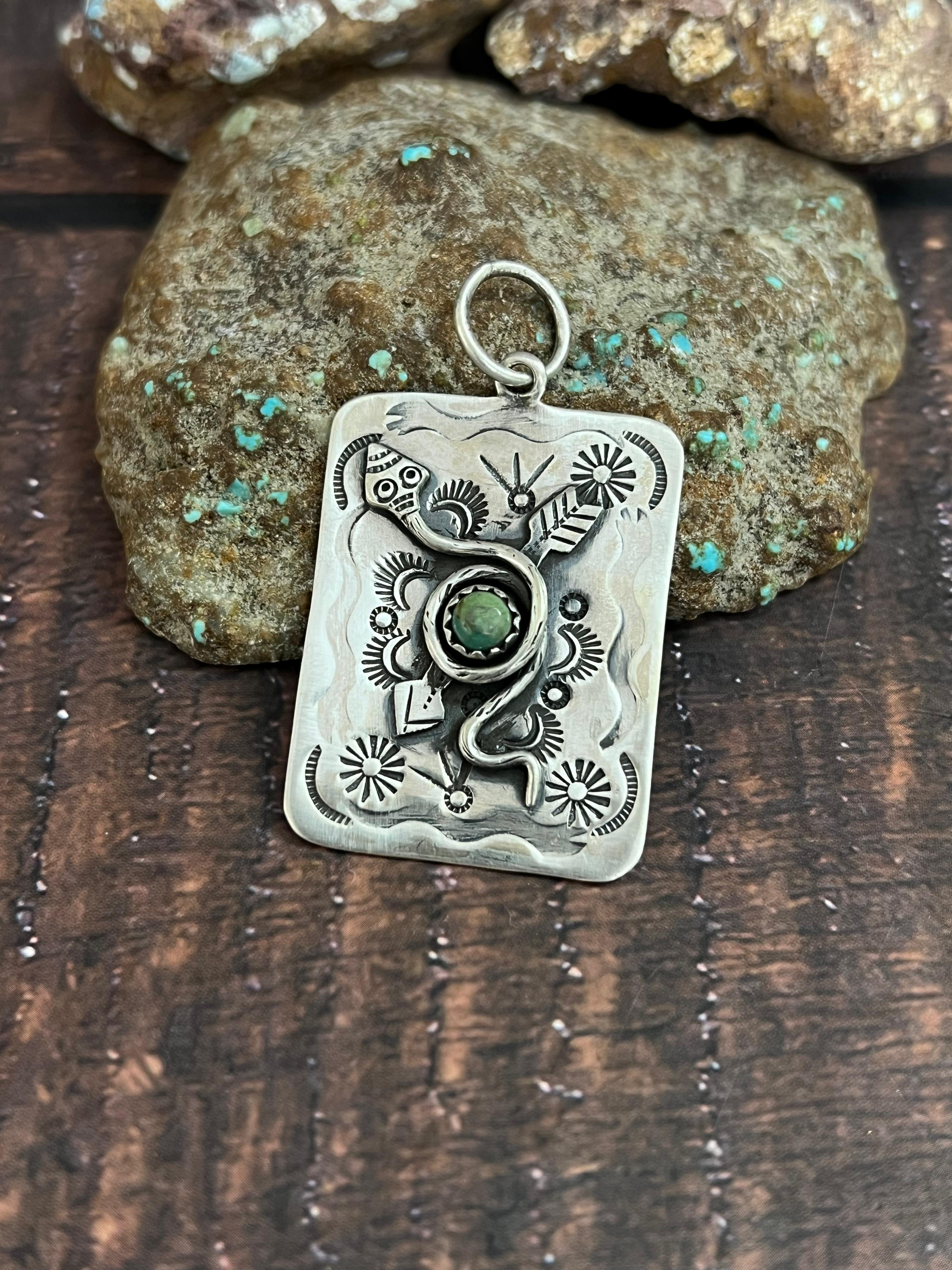 Handmade Sterling Silver Kingman Turquoise Snake Arrow Pendant with Signed Nizhoni