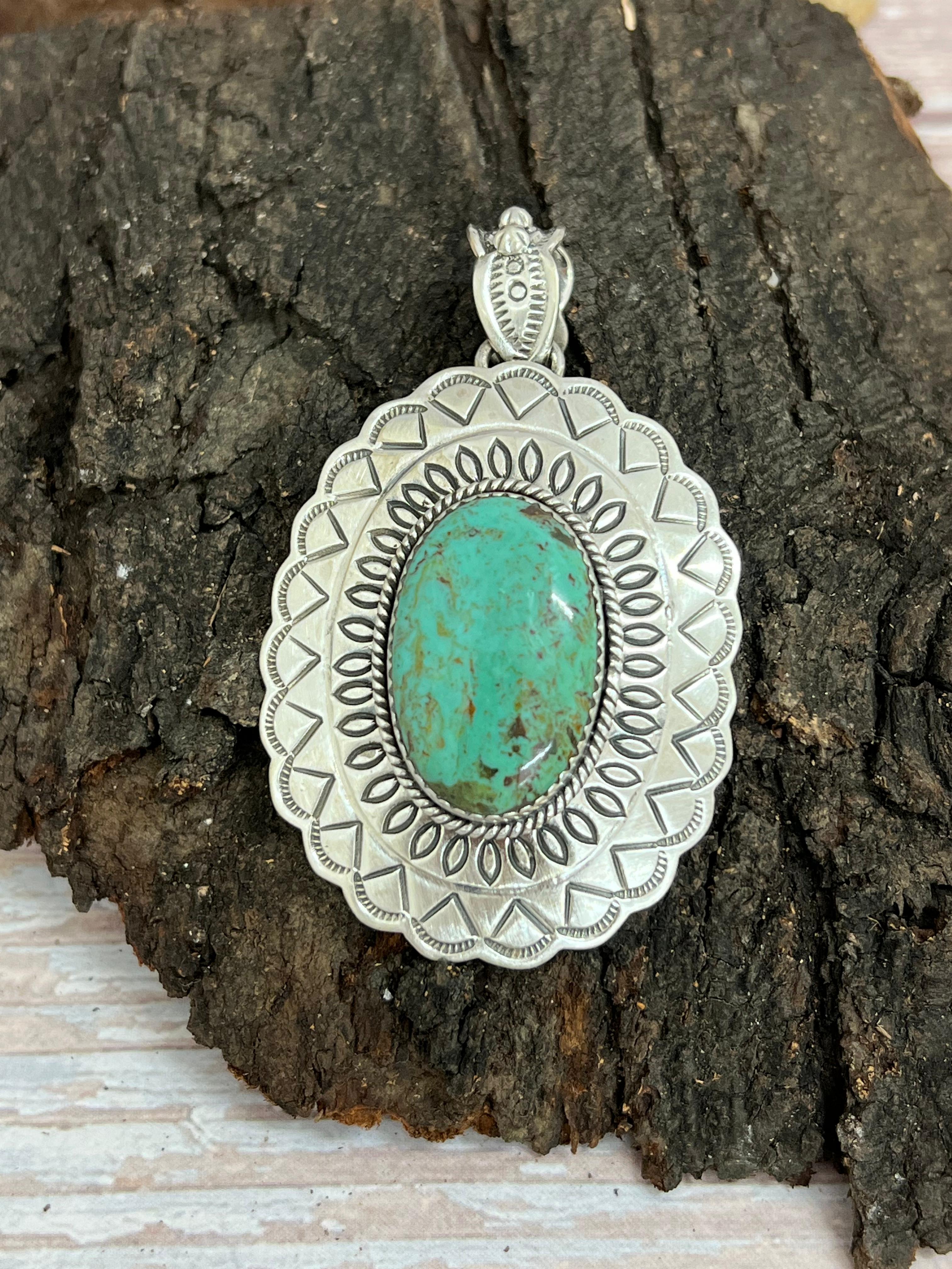 Handmade Sterling Silver Kingman Turquoise Pendant with Signed Nizhoni