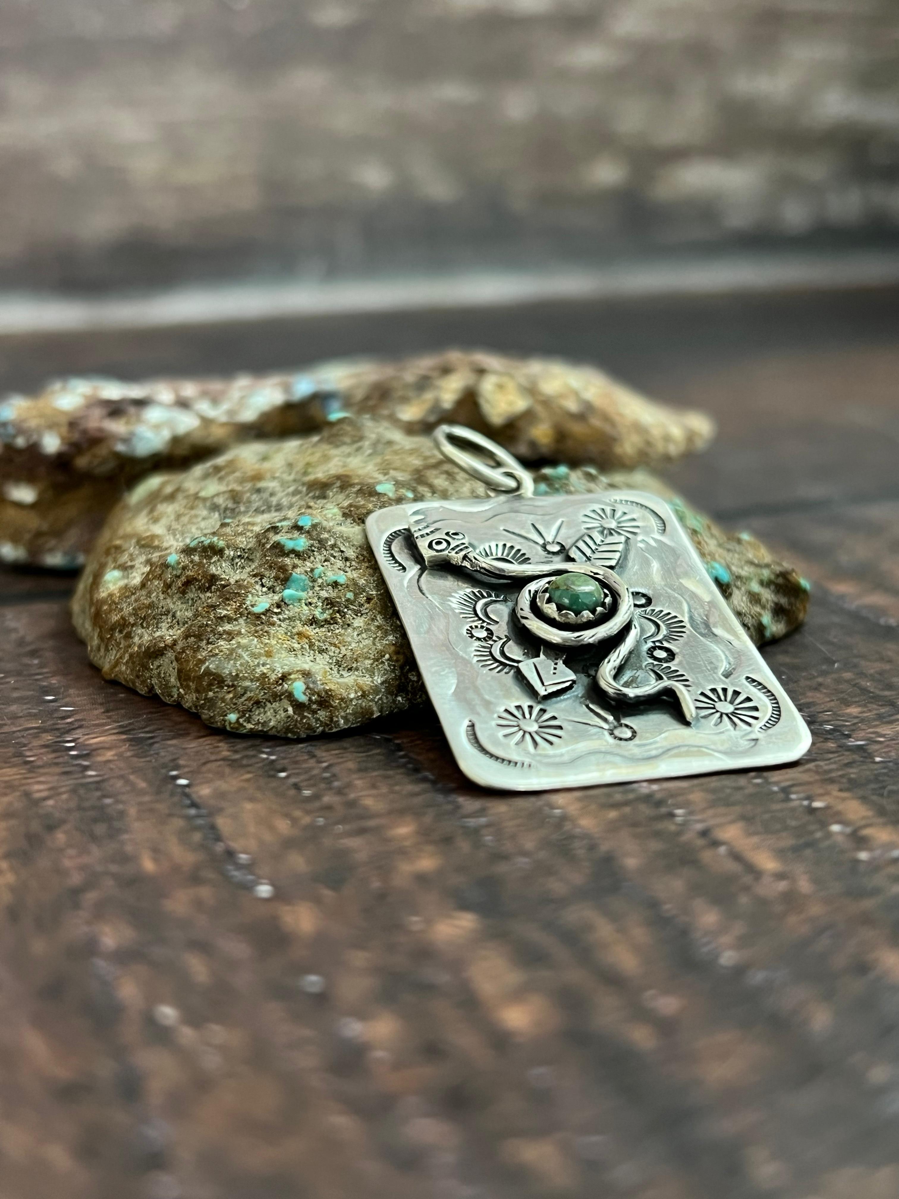 Handmade Sterling Silver Kingman Turquoise Snake Arrow Pendant with Signed Nizhoni