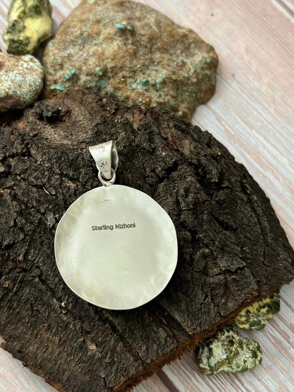 Handmade Sterling Silver Sonoran Mountain Turquoise Pendant with Signed Nizhoni