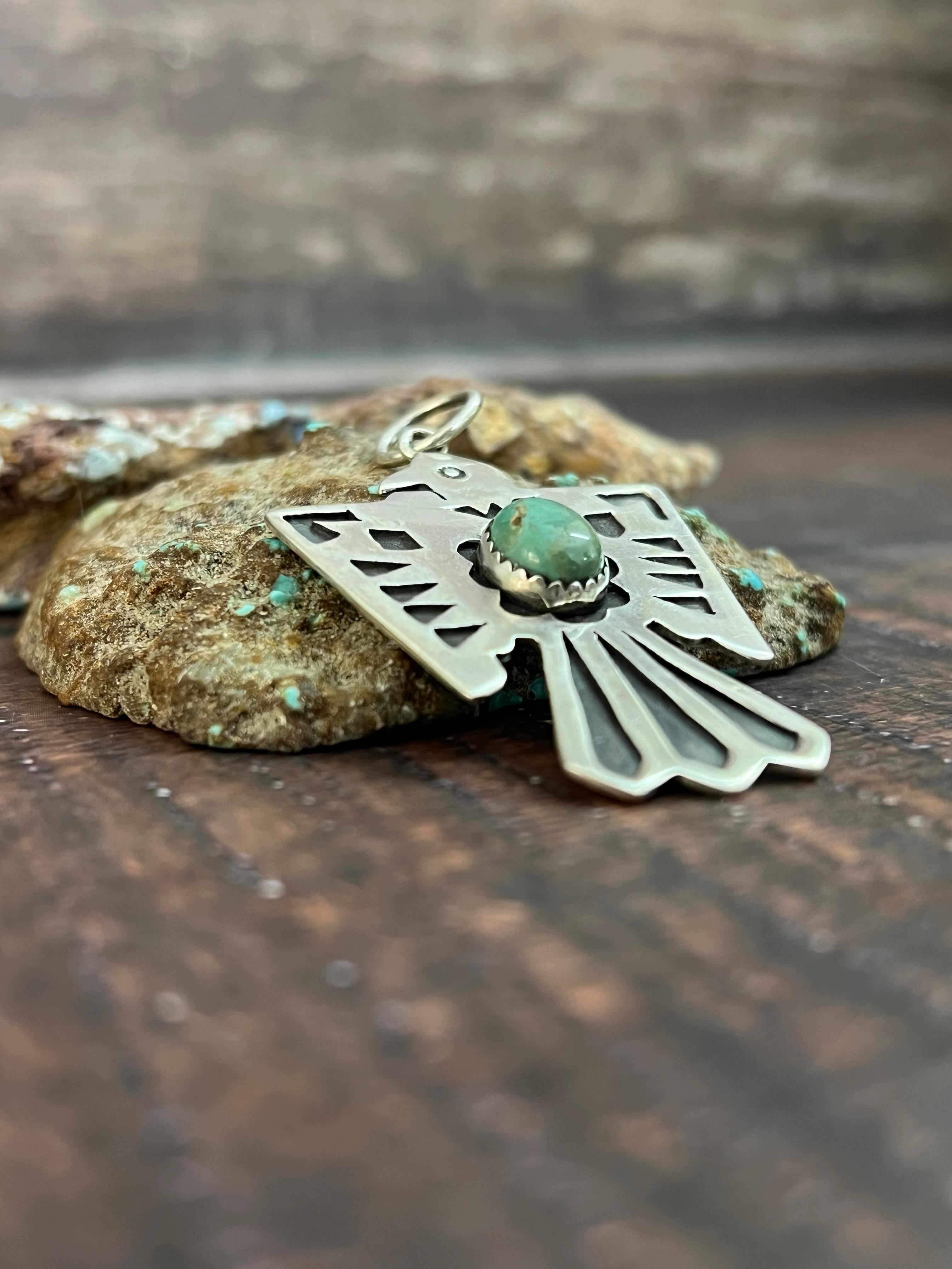 Handmade Sterling Silver Kingman Turquoise Thunder Bird Pendant with Signed Nizhoni