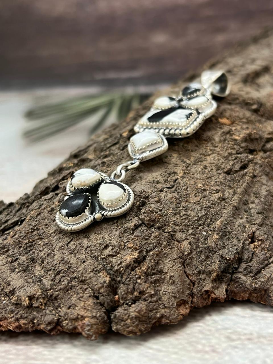 Handmade Sterling Silver White Buffalo Pendant with Signed Nizhoni