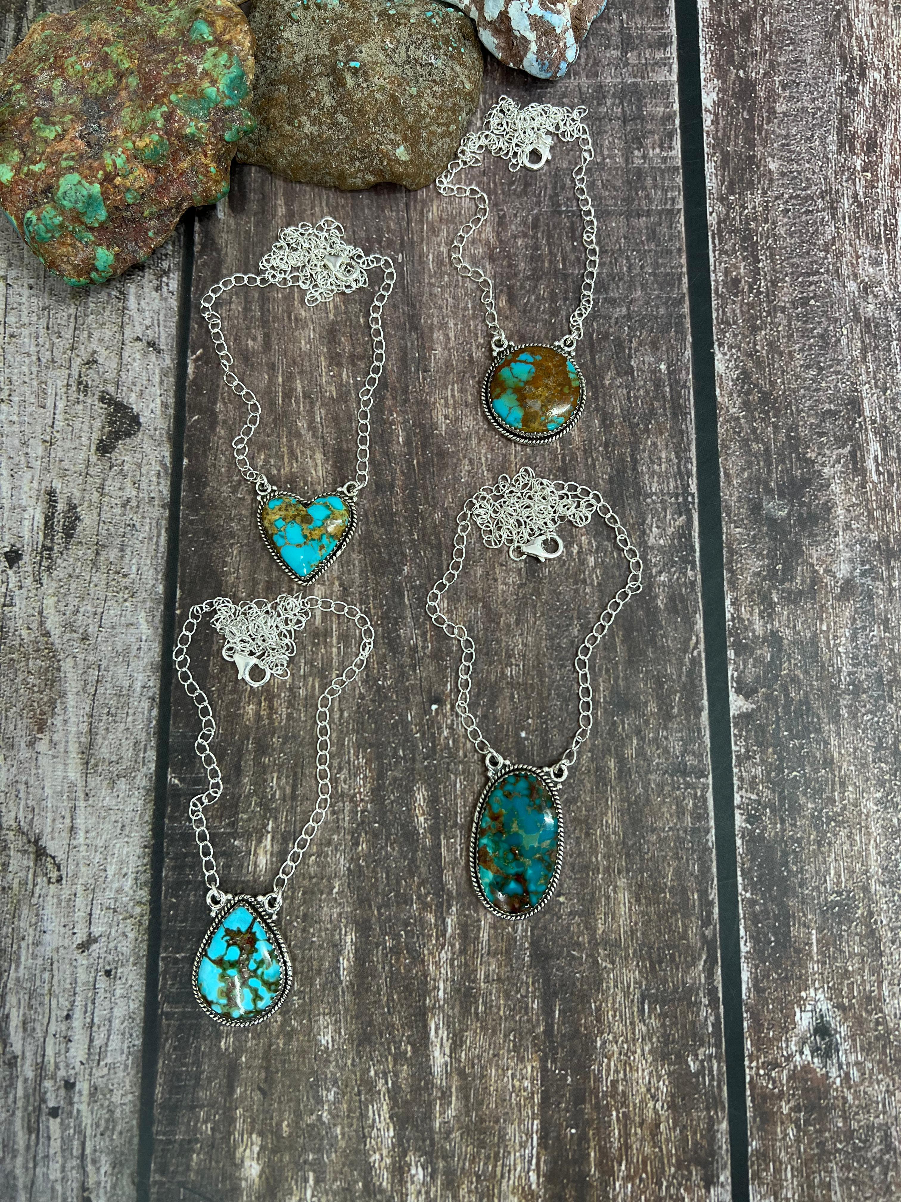 Handmade Sterling Silver Hardy Pit Necklace with Signed Nizhoni