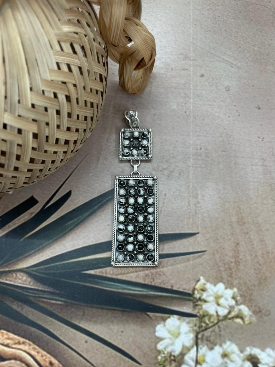 Handmade Sterling Silver White Buffalo Pendant with Signed Nizhoni