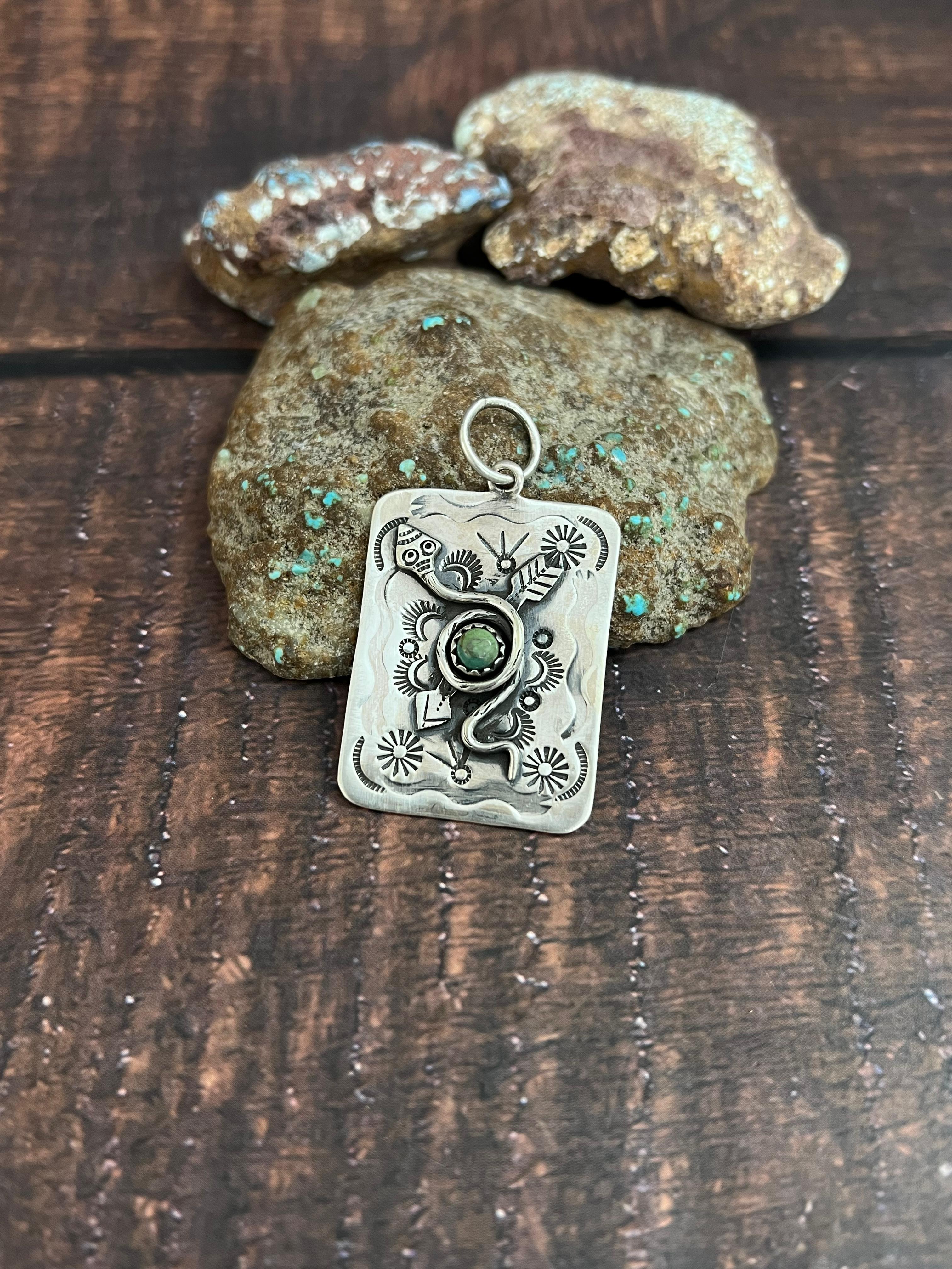 Handmade Sterling Silver Kingman Turquoise Snake Arrow Pendant with Signed Nizhoni