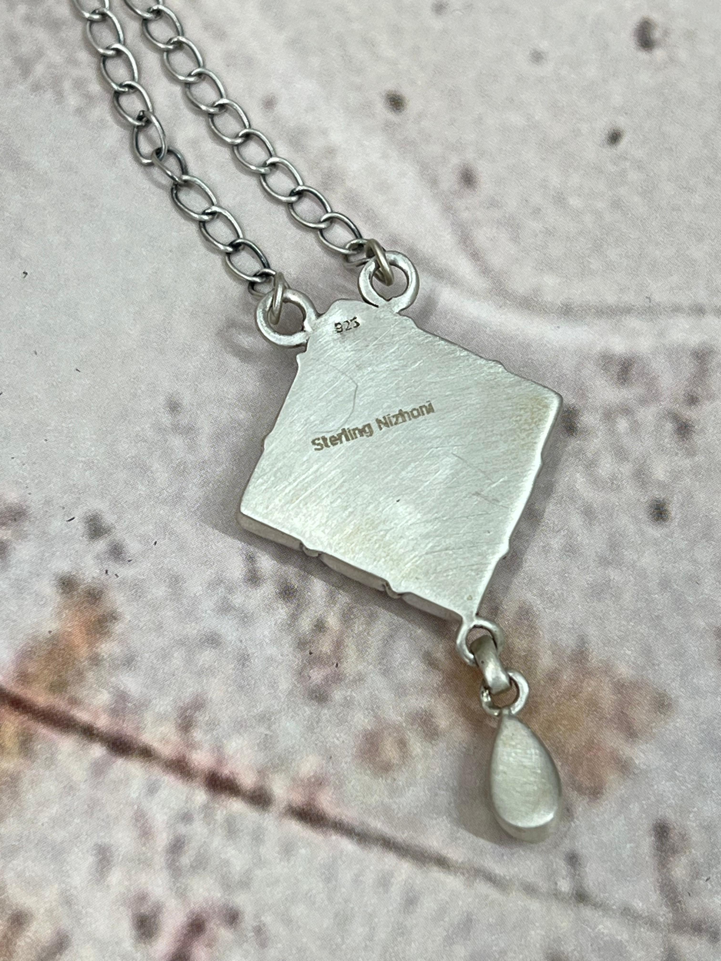 Handmade Sterling Silver White Buffalo Turquoise Necklace with Signed Nizhoni