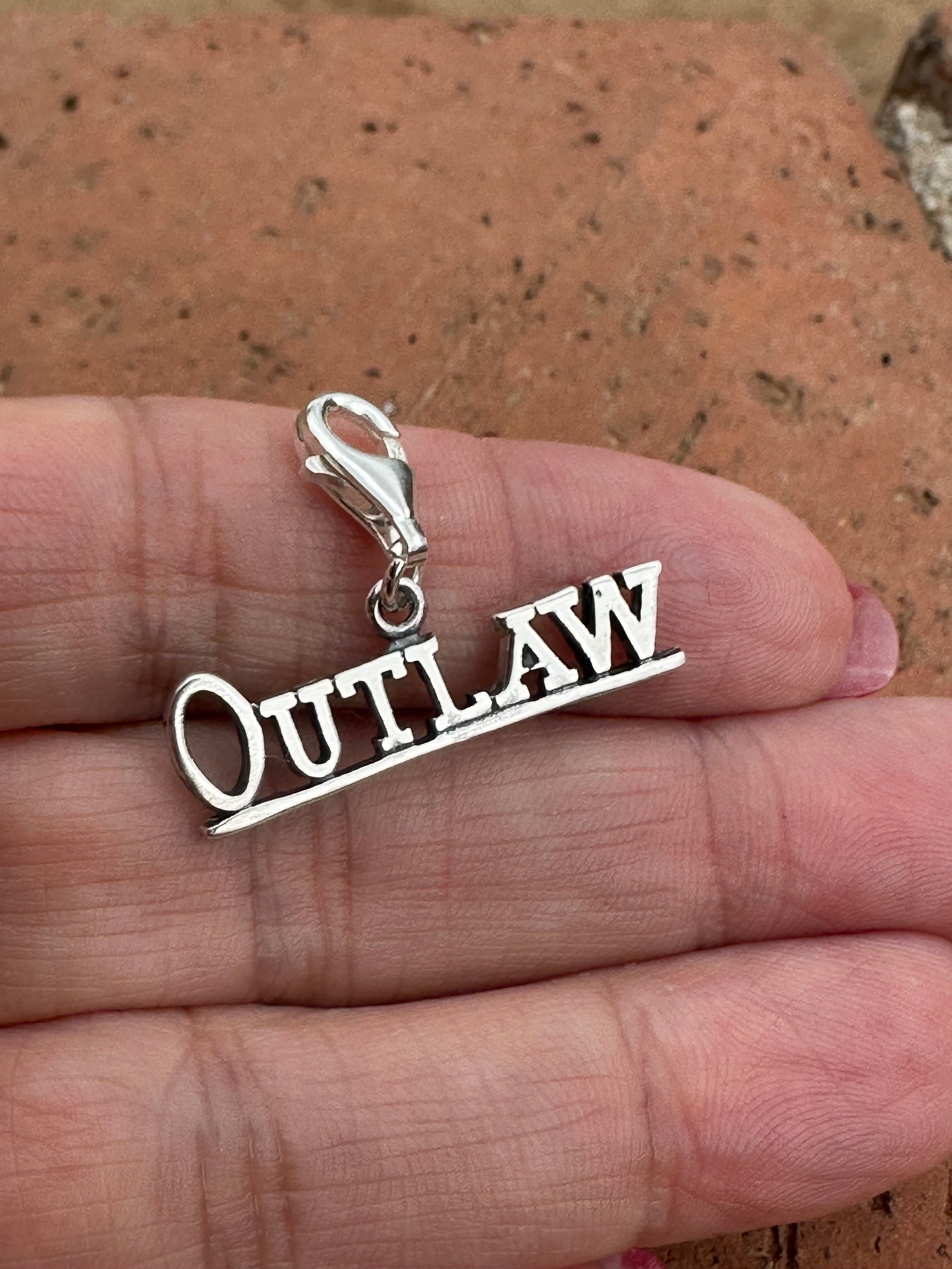 Sterling Silver “OUTLAW” Charm