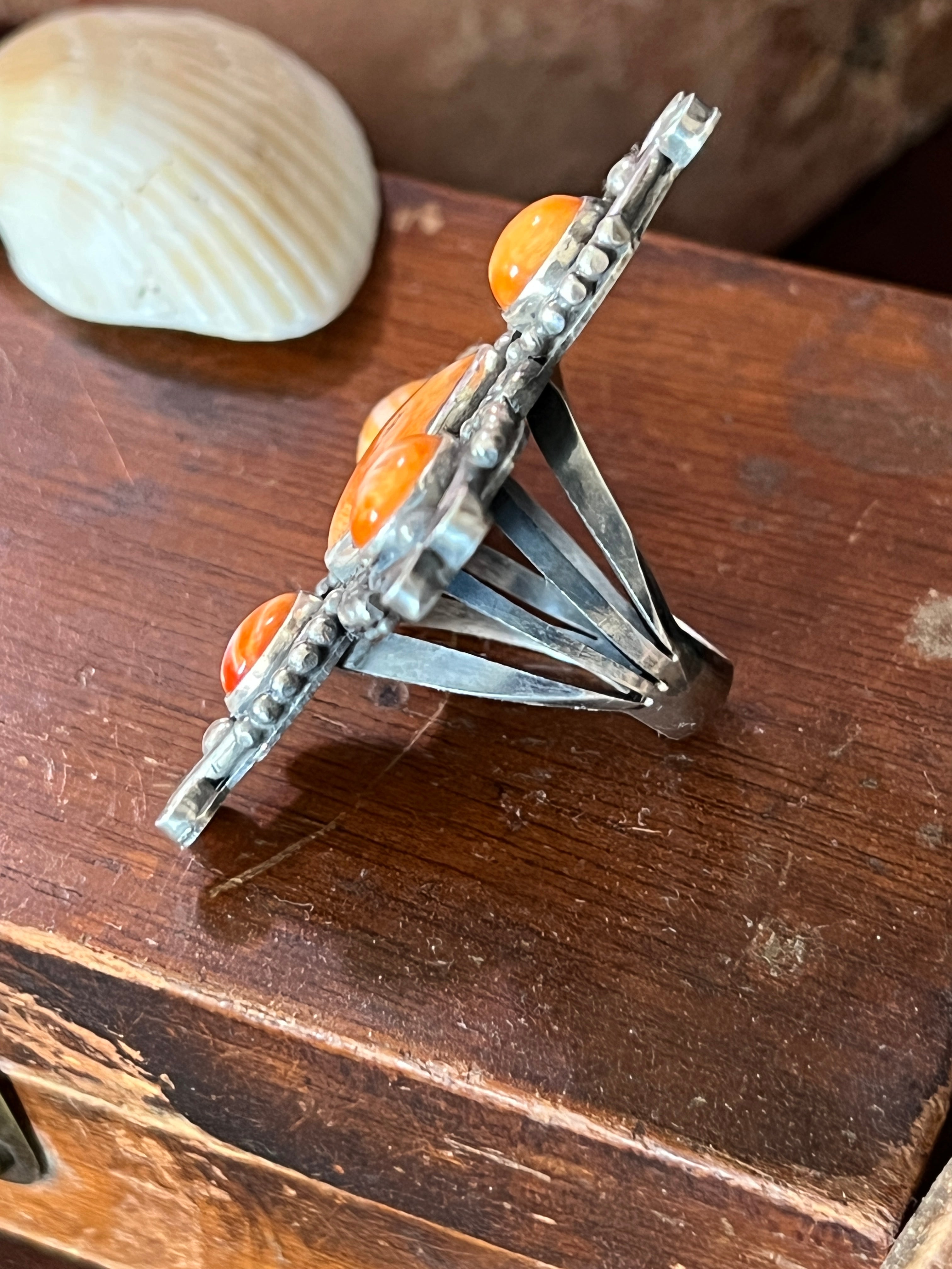 Apache Sterling Silver and Orange Spiny Oyster Shell 4 Direction Ring by Rosella Paxson, Size 10
