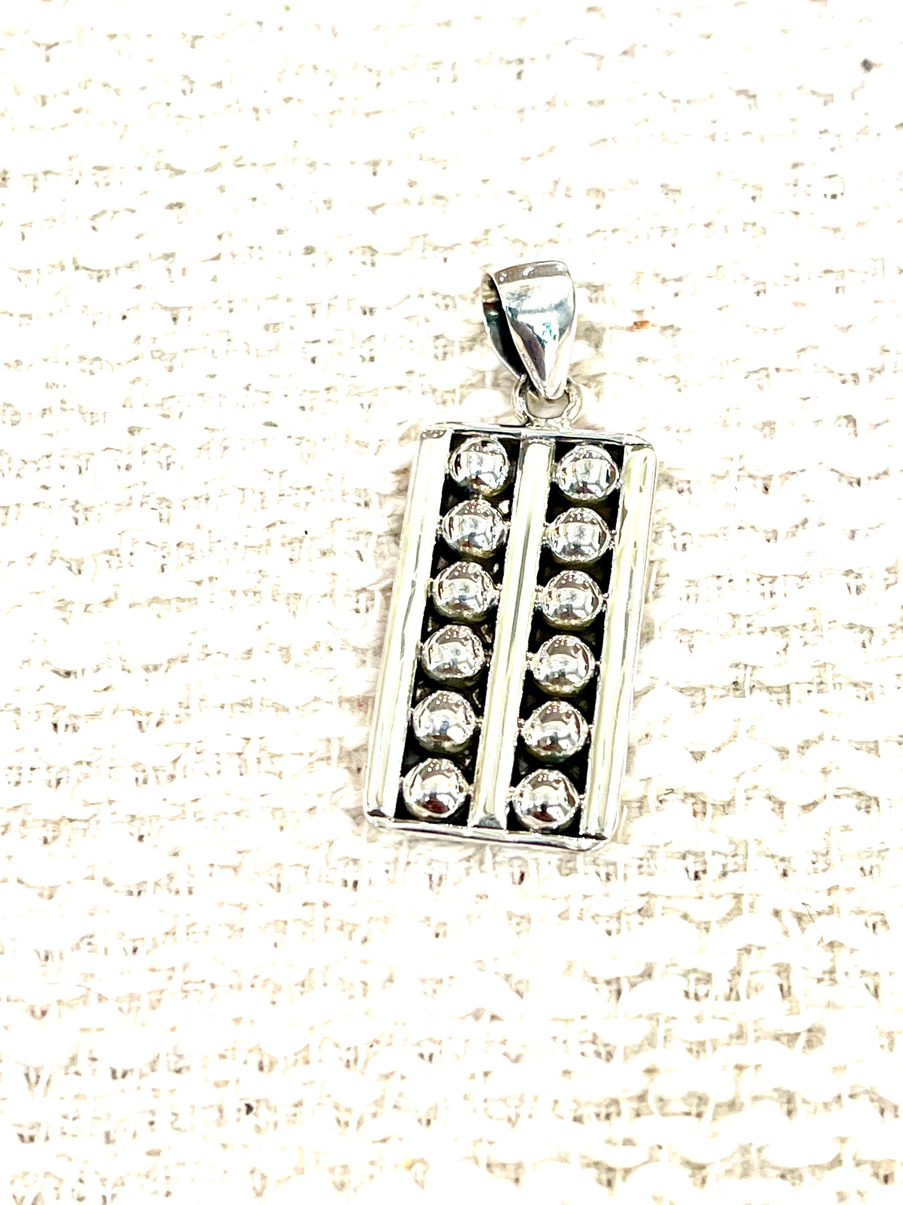 Handmade Sterling Silver Bar Pendant with Signed Nizhoni