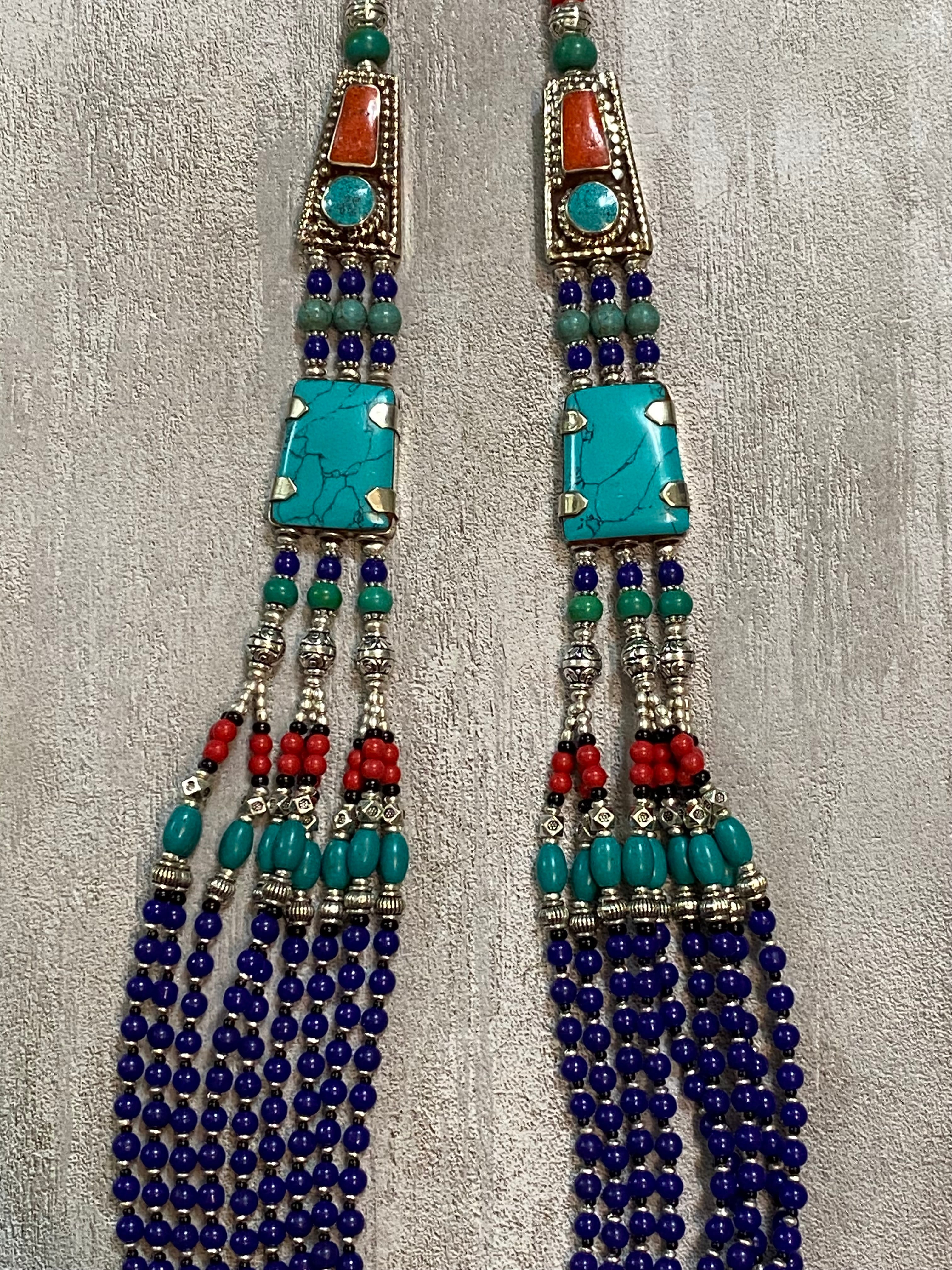 Silver Plated Tibetan Style Nine Strand Turquoise, Red Coral, & Blue Lapis Beaded Necklace
