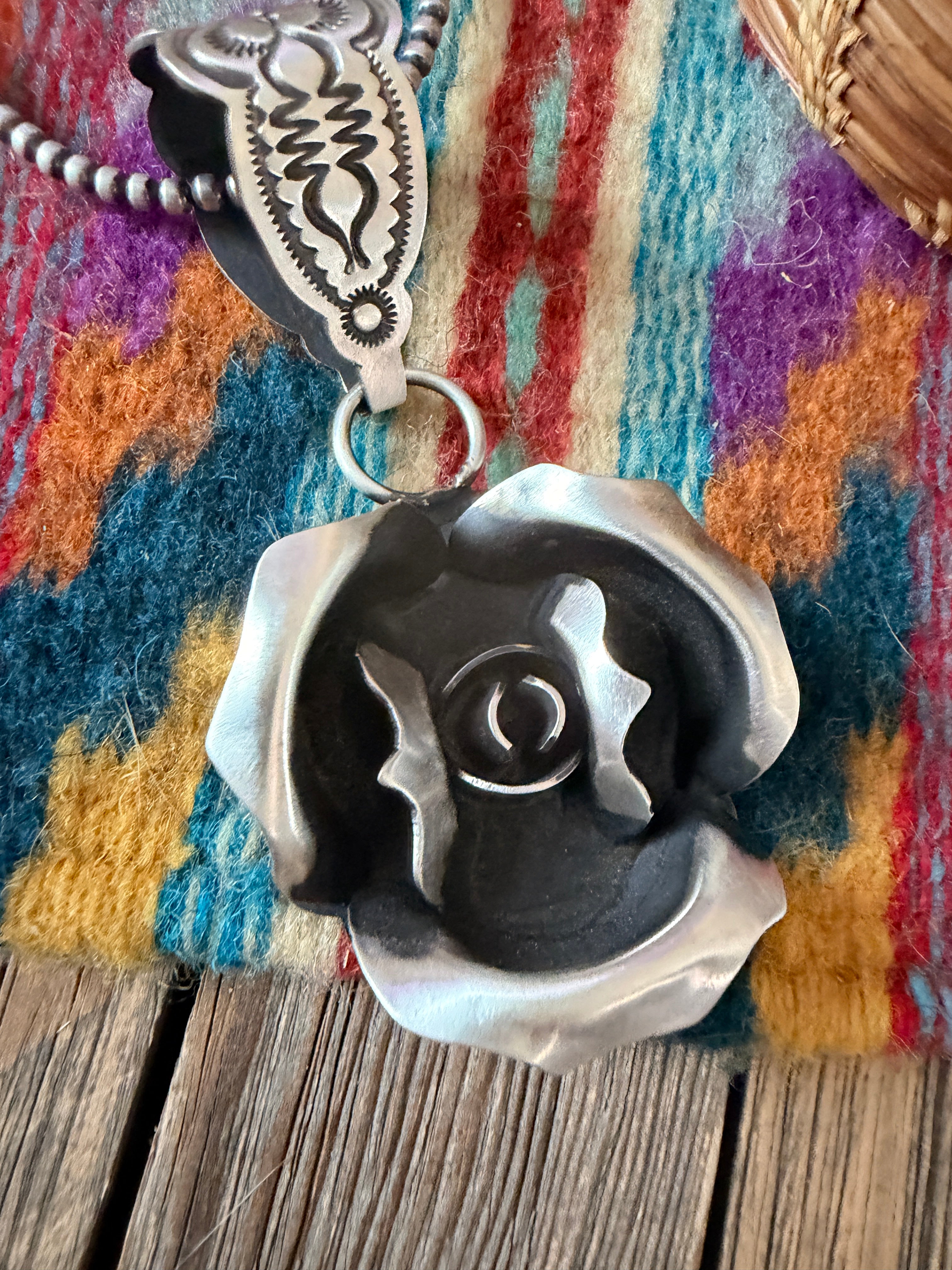 Handcrafted Sterling Silver Rose Pendant by Leander Tahe