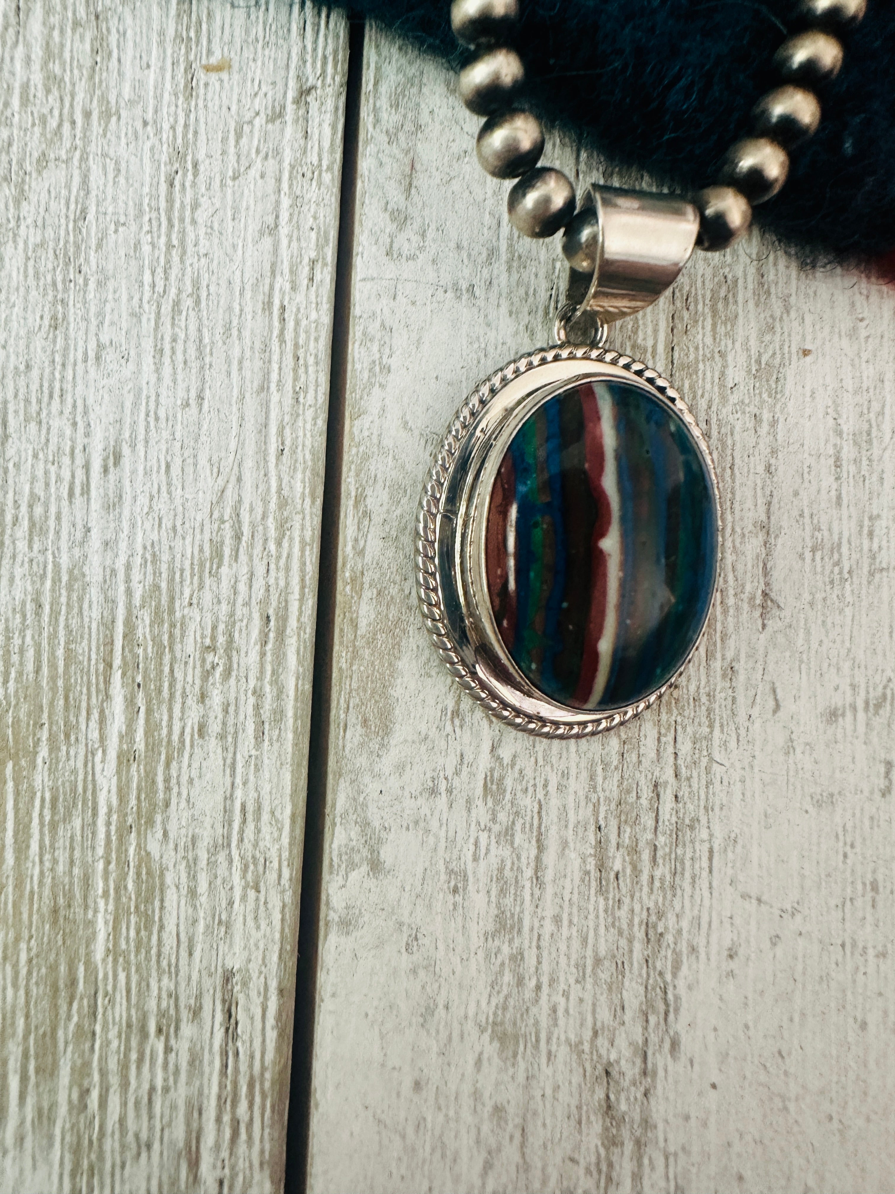 Handcrafted Rainbow Calsilica and Sterling Silver Star Pendant