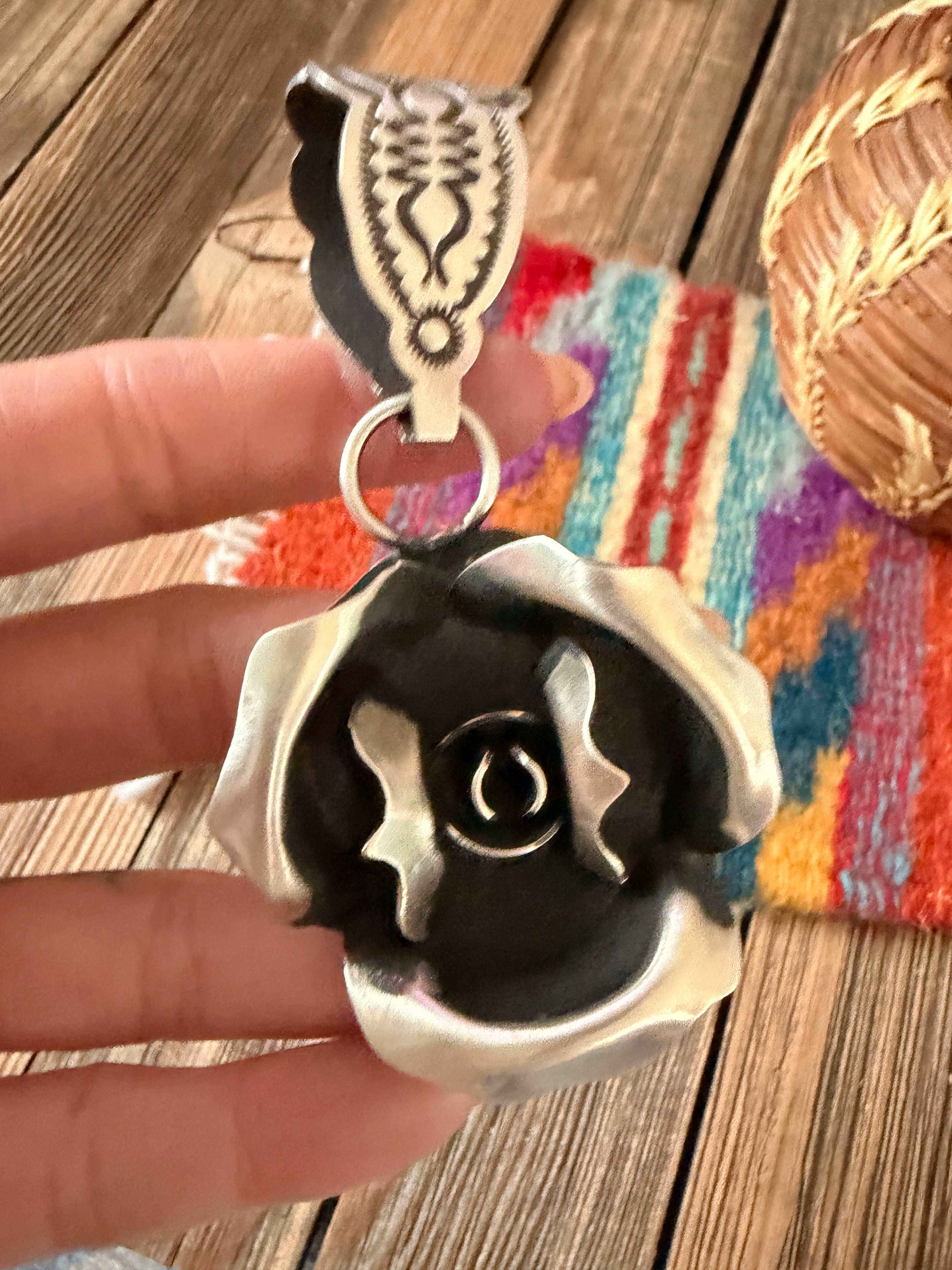 Handcrafted Sterling Silver Rose Pendant by Leander Tahe