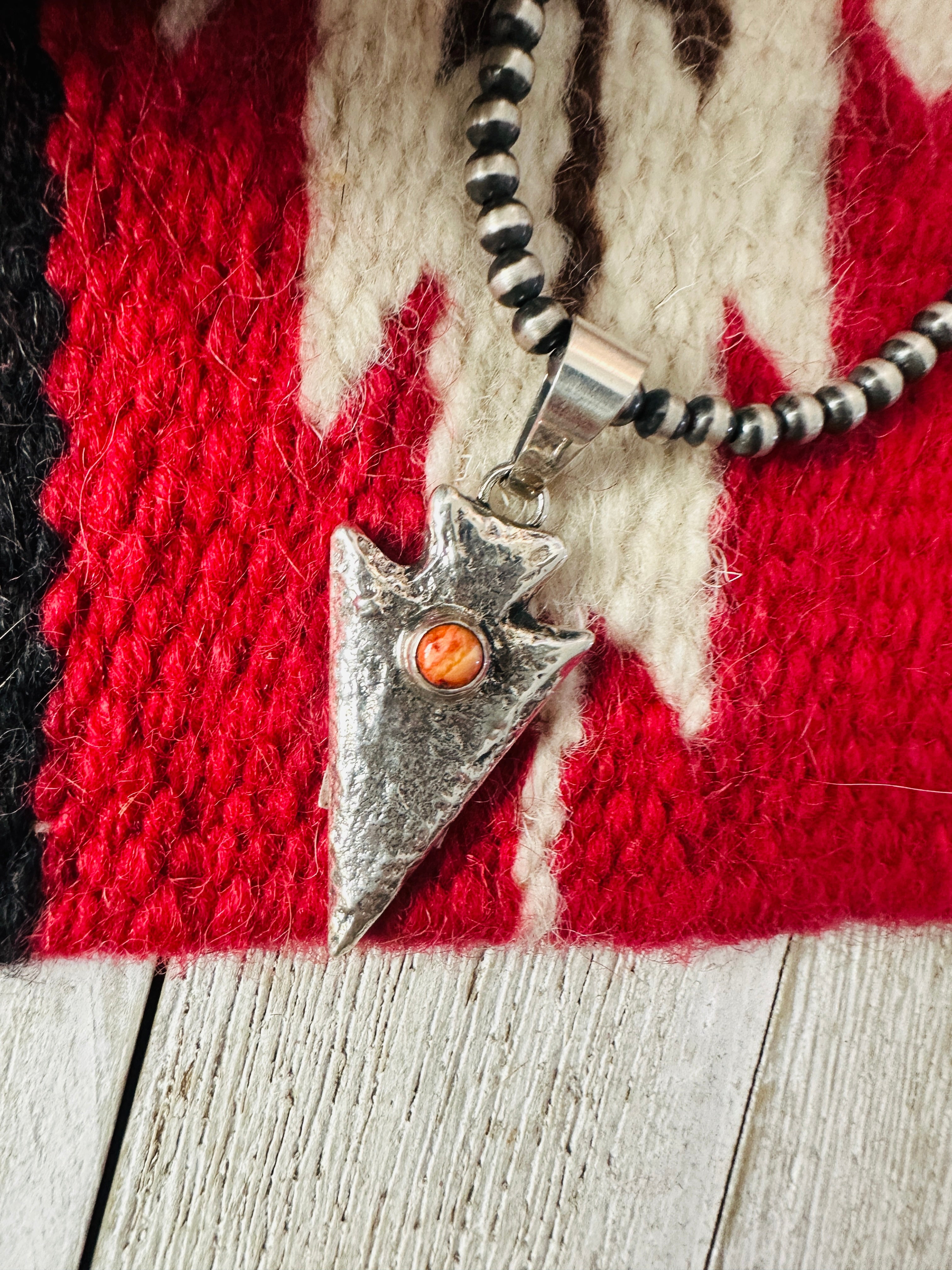 Handcrafted Sterling Silver and Orange Spiny Arrowhead Pendant by Charles Johnson