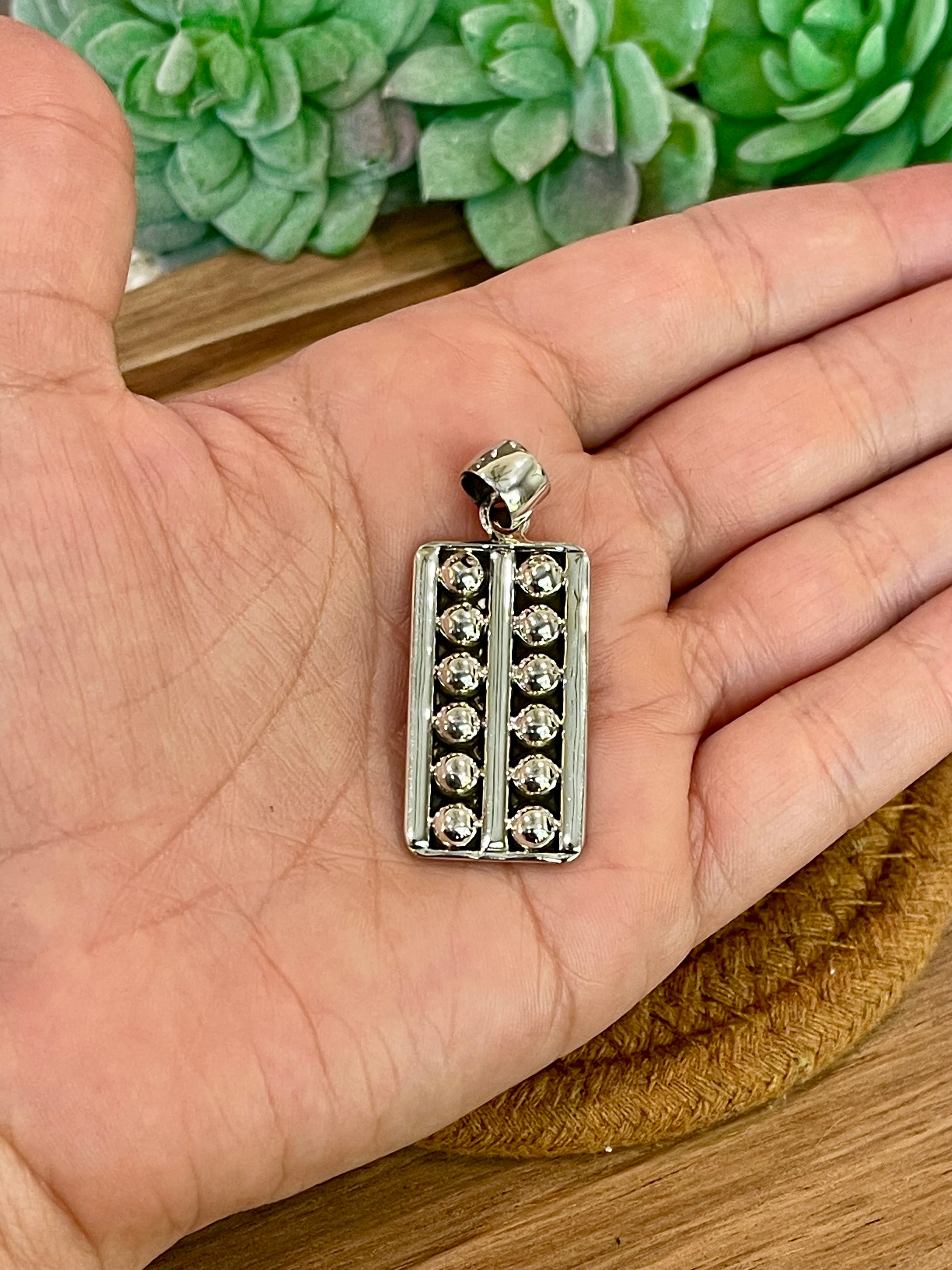 Handmade Sterling Silver Bar Pendant with Signed Nizhoni