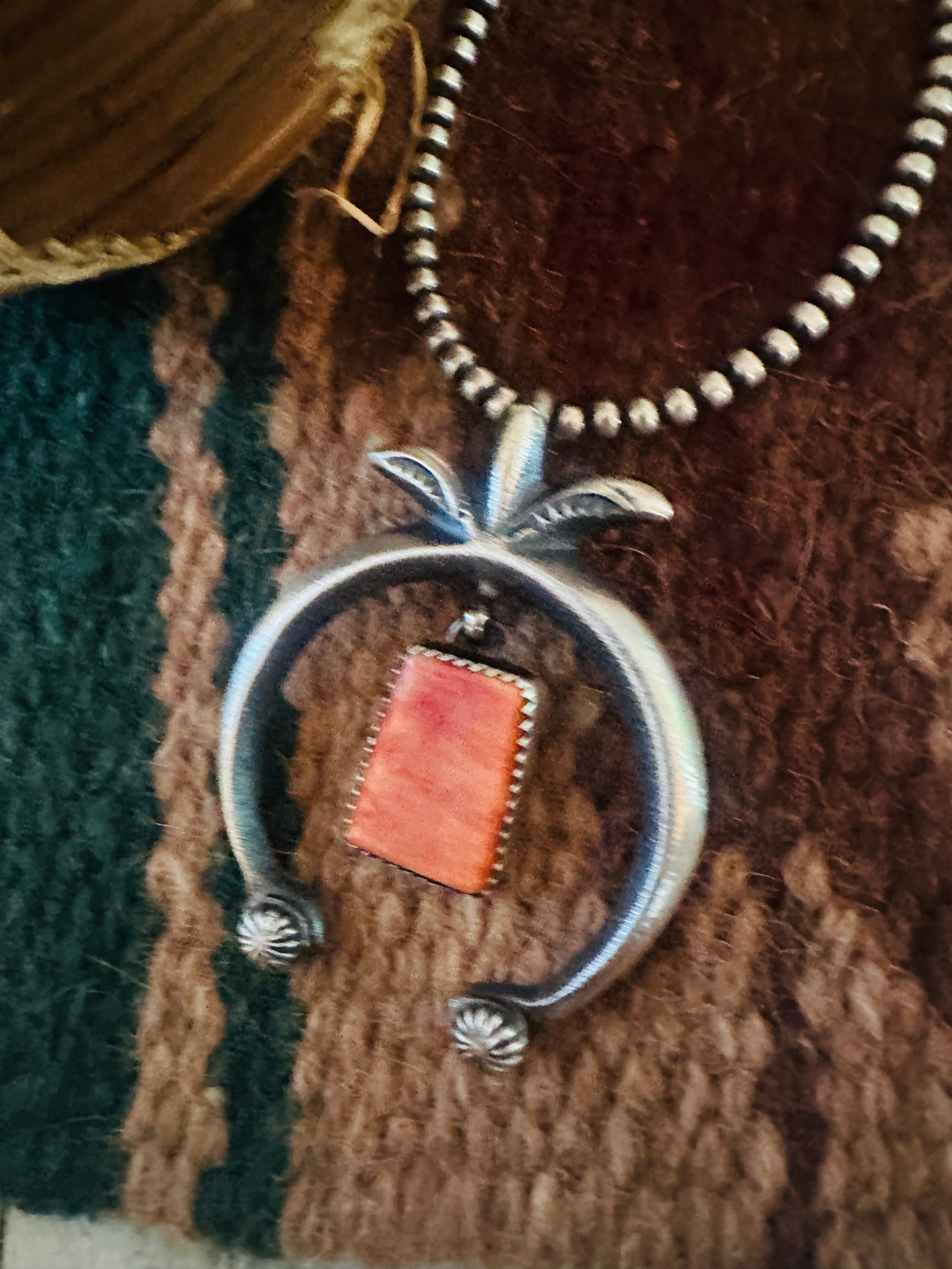 Handcrafted Sterling Silver & Orange Spiny Naja Pendant by Martha Cayatineto