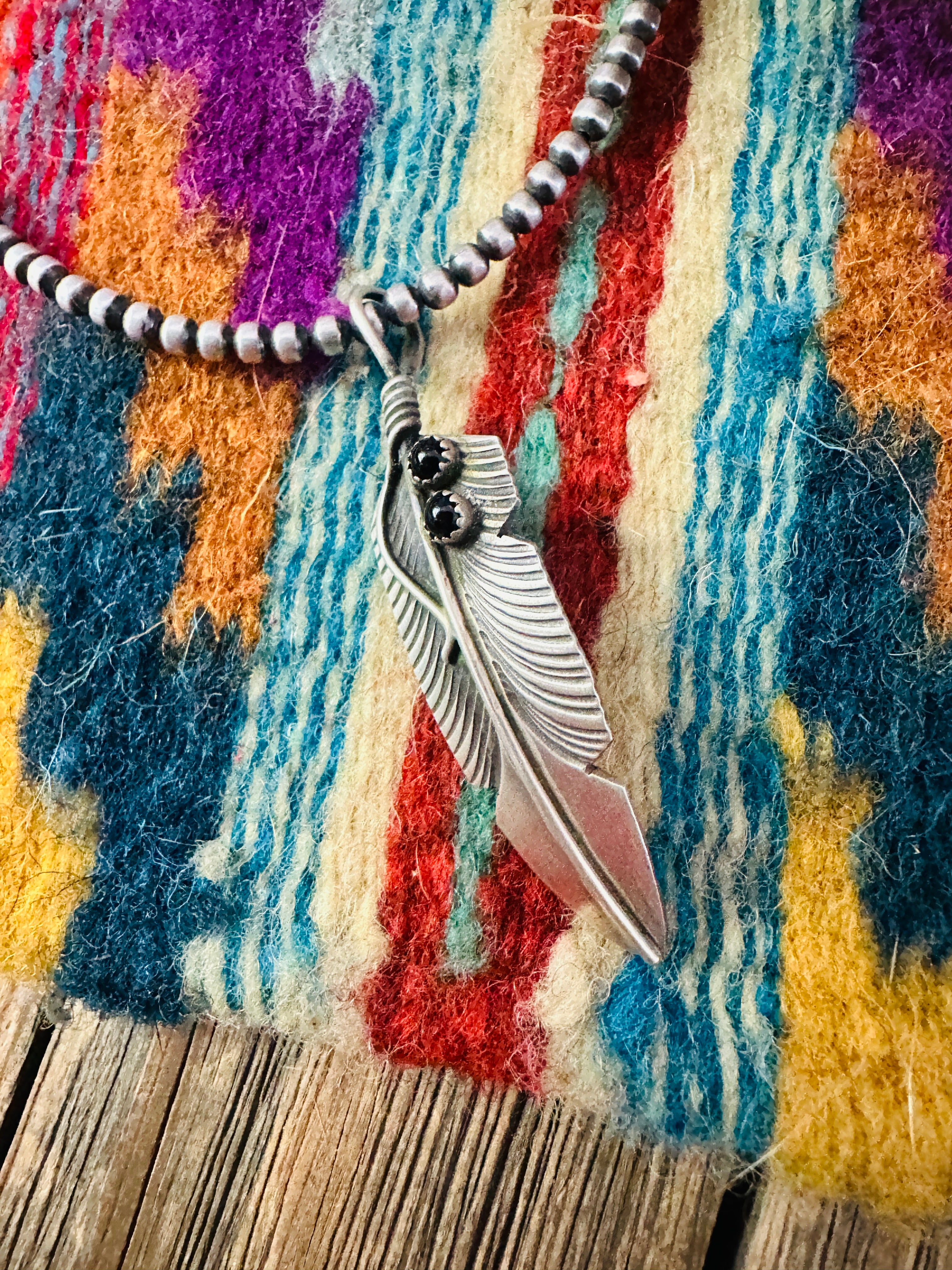 Handcrafted Sterling Silver and Onyx Feather Pendant