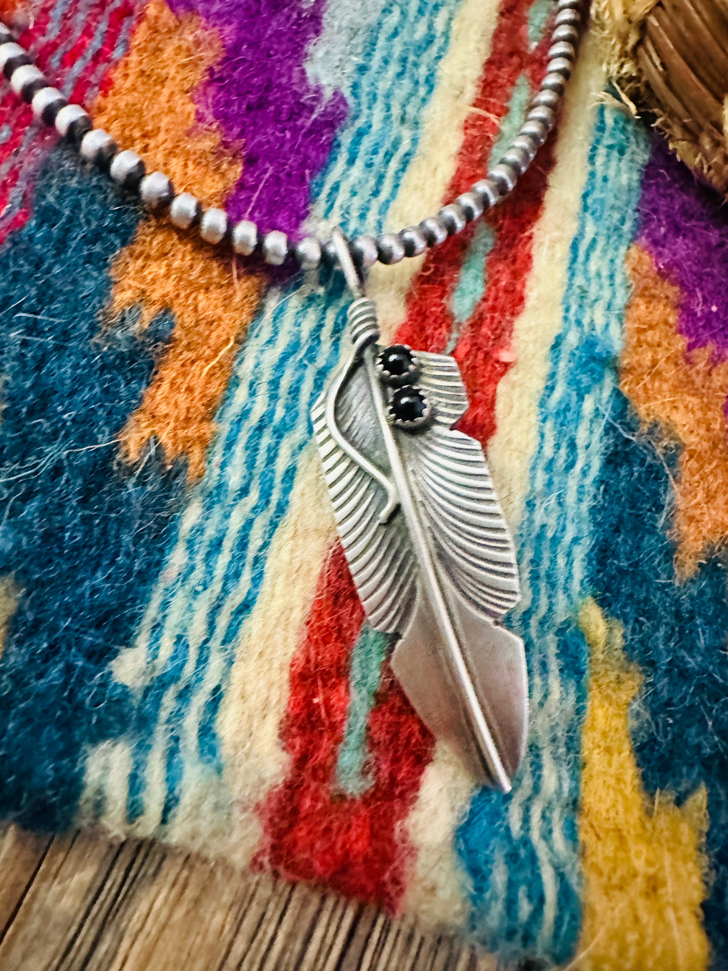 Handcrafted Sterling Silver and Onyx Feather Pendant