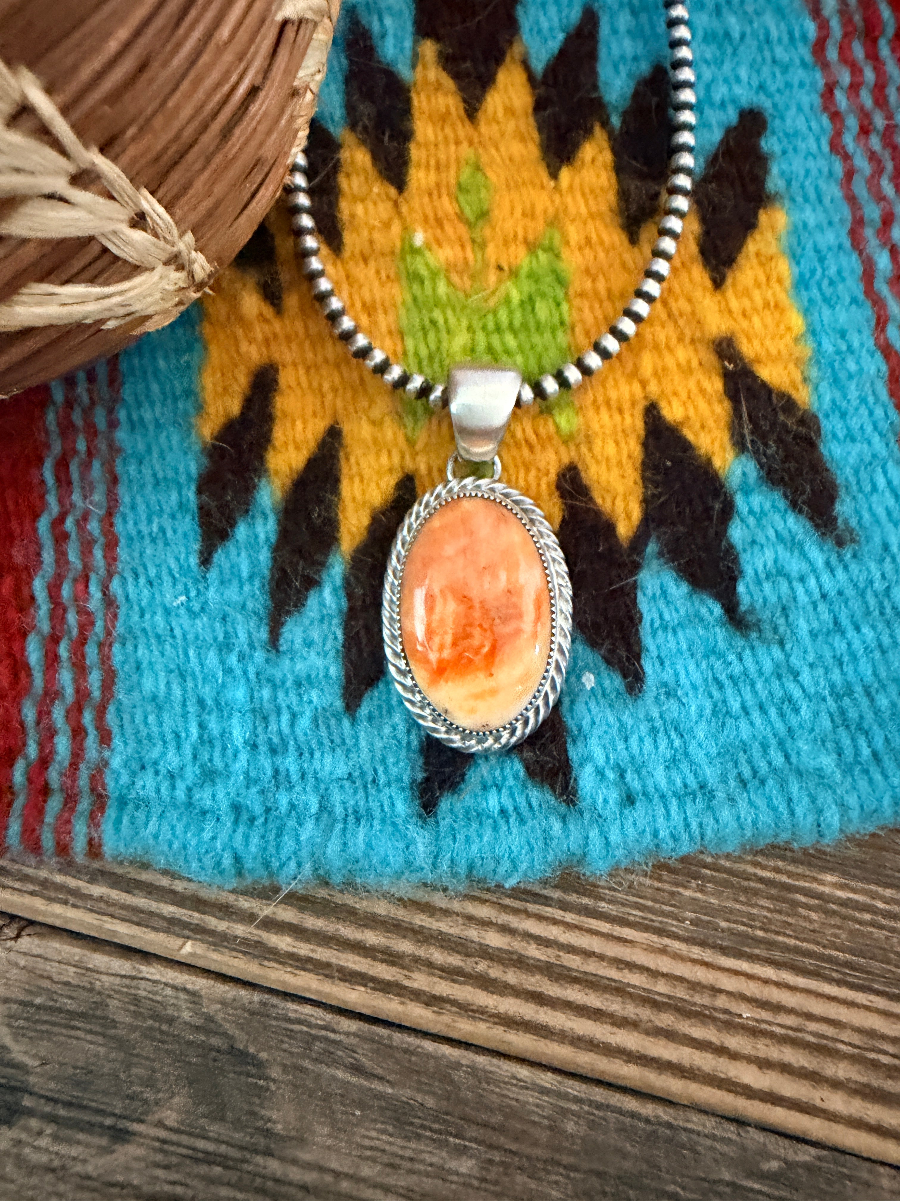 Handcrafted Sterling Silver and Spiny Oyster Pendant