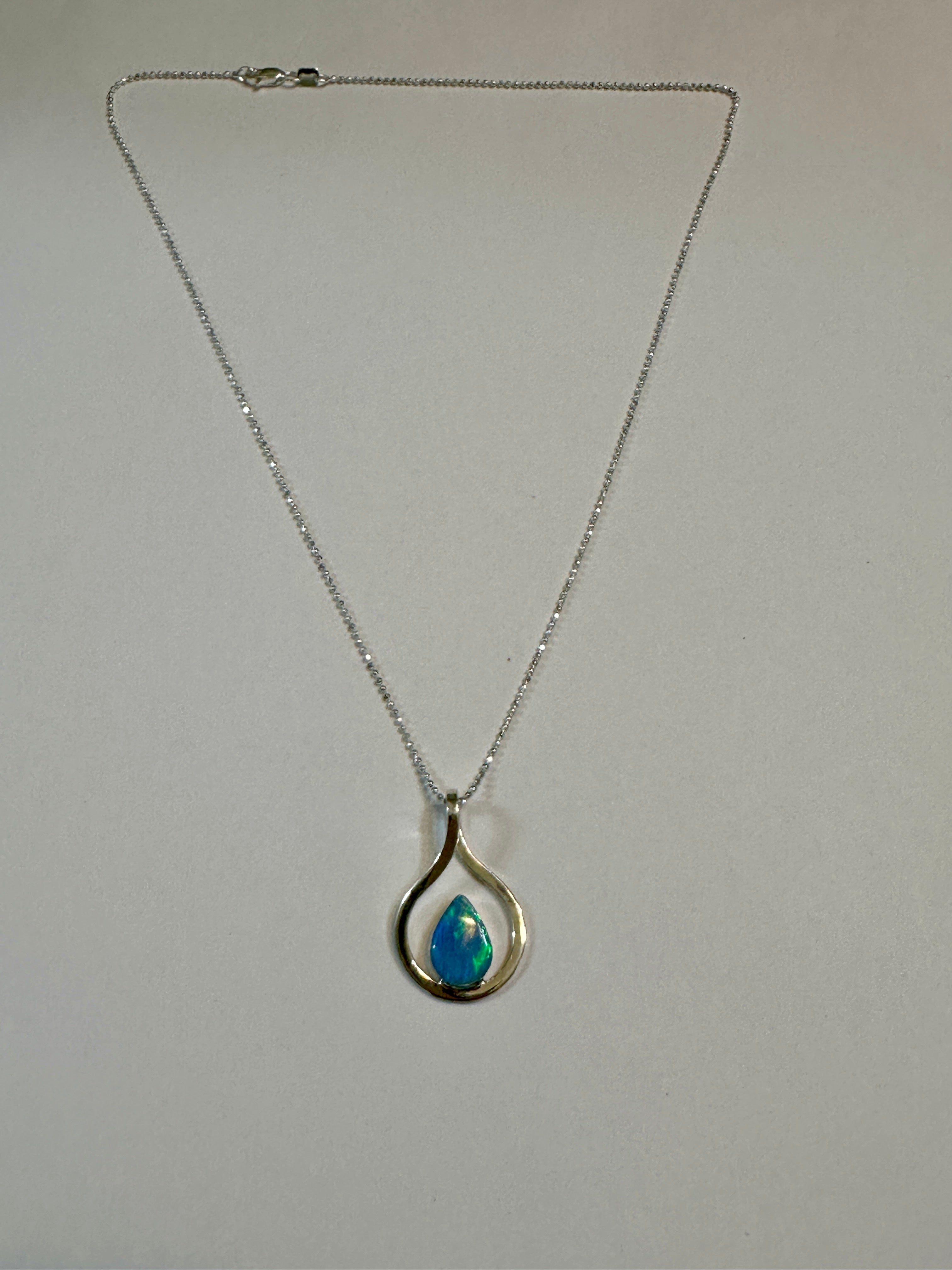 Light Blue Opal Teardrop in Silver Frame Necklace