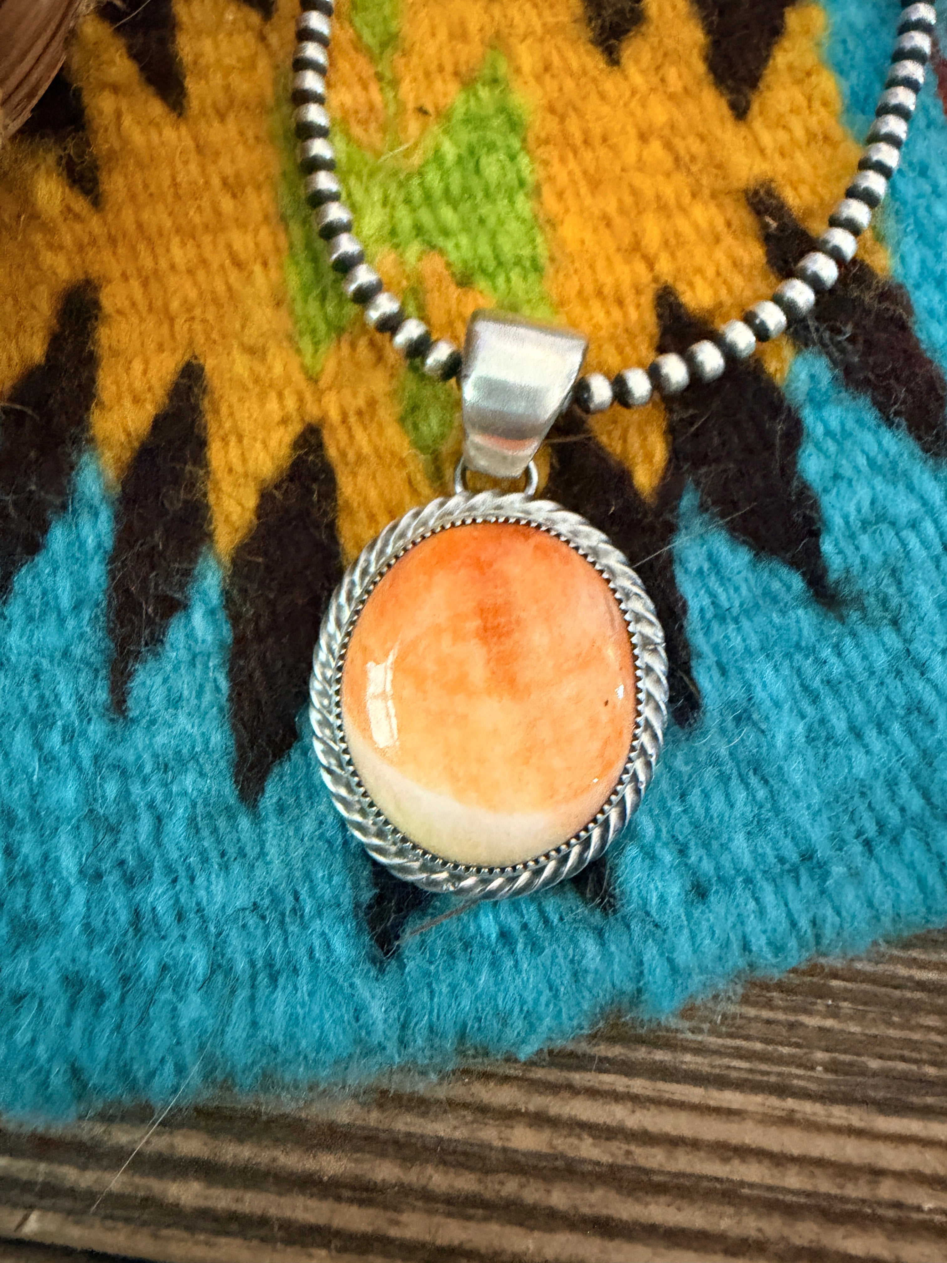 Handcrafted Sterling Silver and Spiny Oyster Pendant