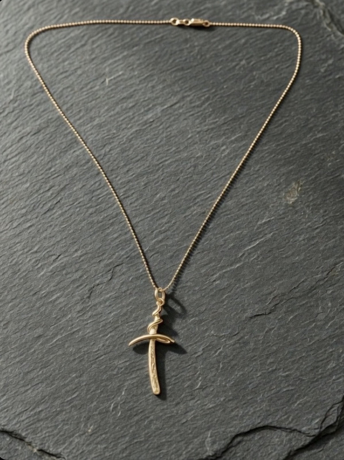 Sterling Silver Textured Cross Necklace With Swirl