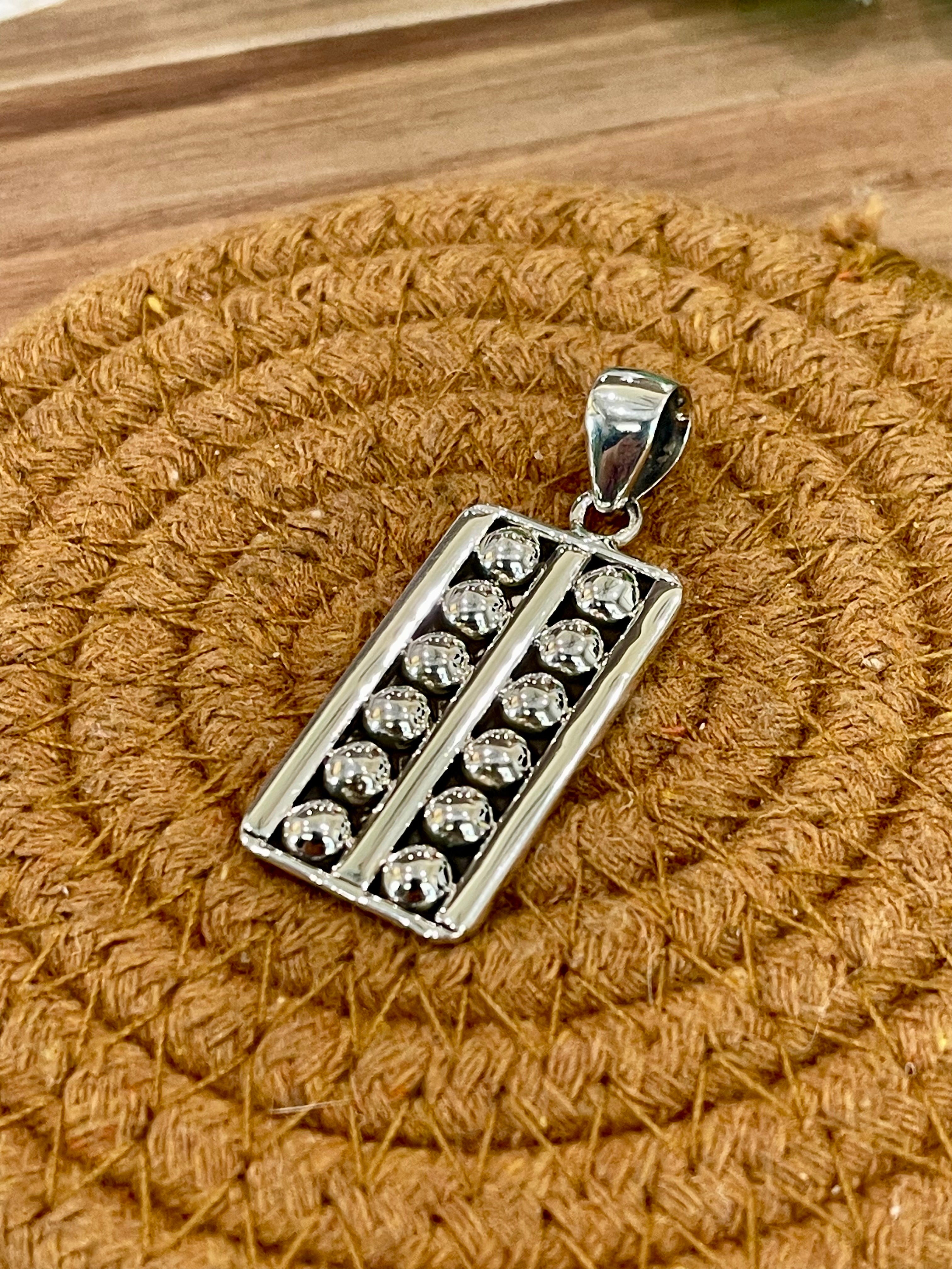 Handmade Sterling Silver Bar Pendant with Signed Nizhoni