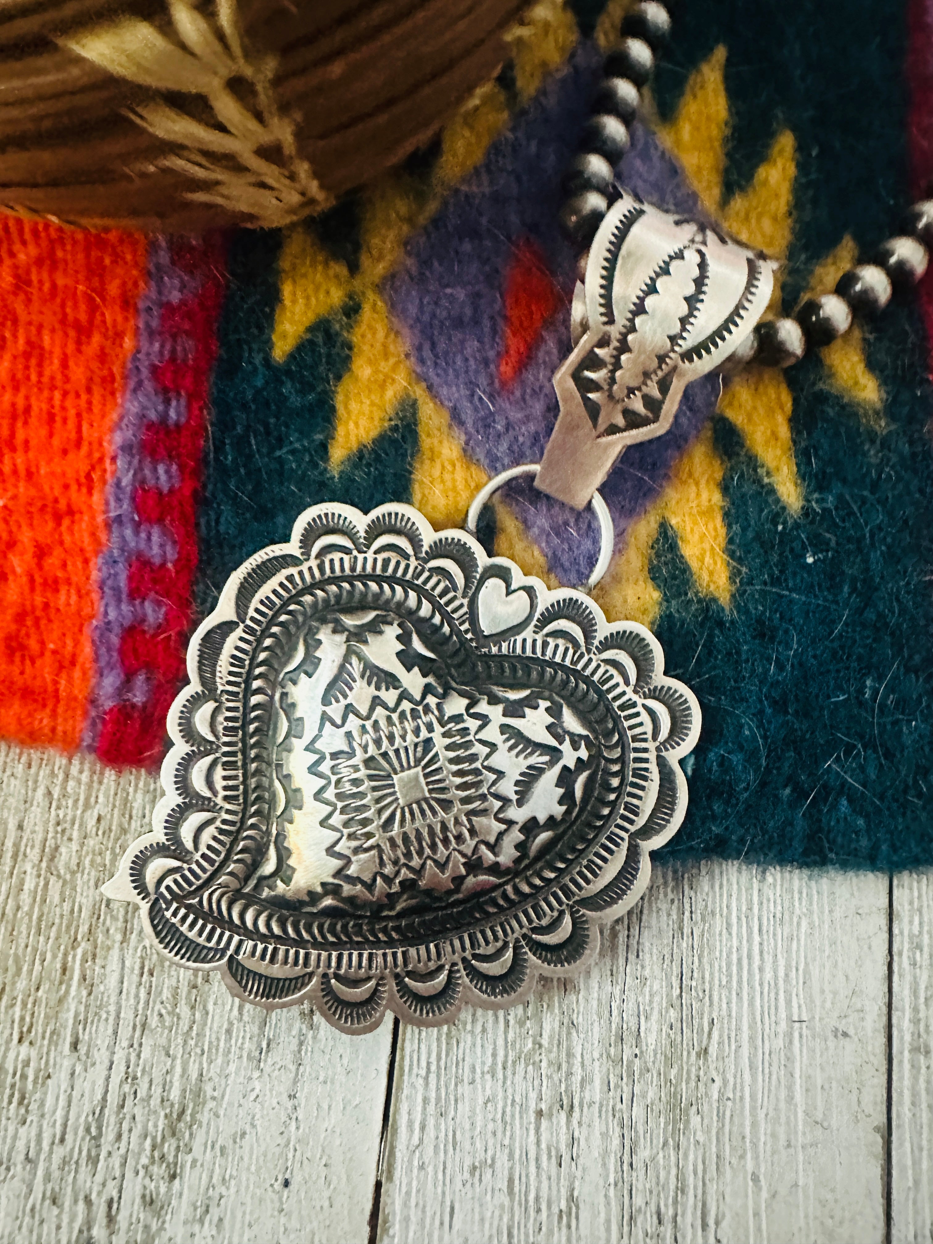 Handcrafted Sterling Silver Heart Concho Pendant by Leander Tahe