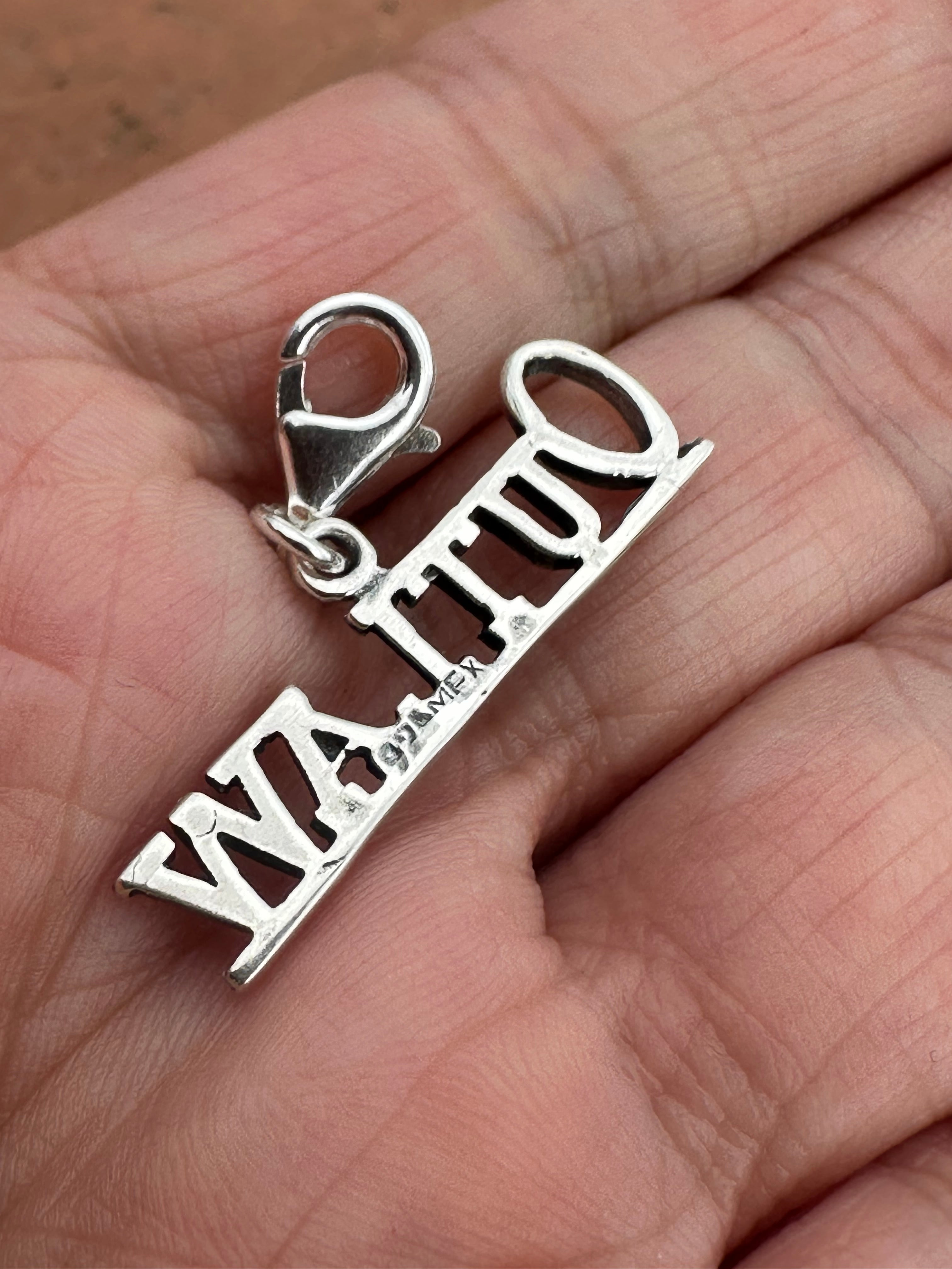 Sterling Silver “OUTLAW” Charm