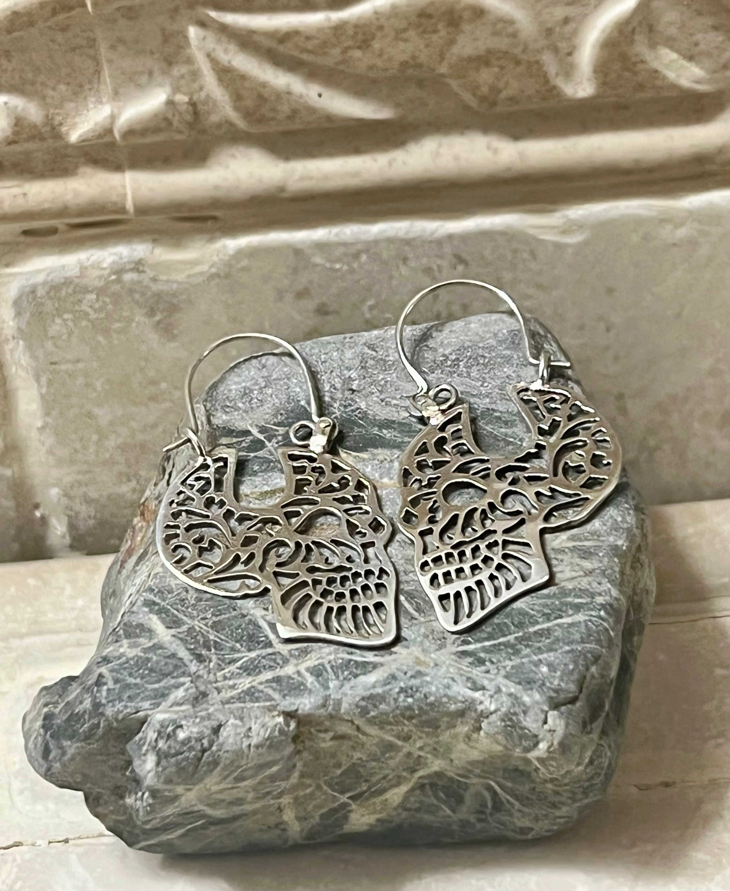 Pierced Skull Profile Sterling Silver Earrings