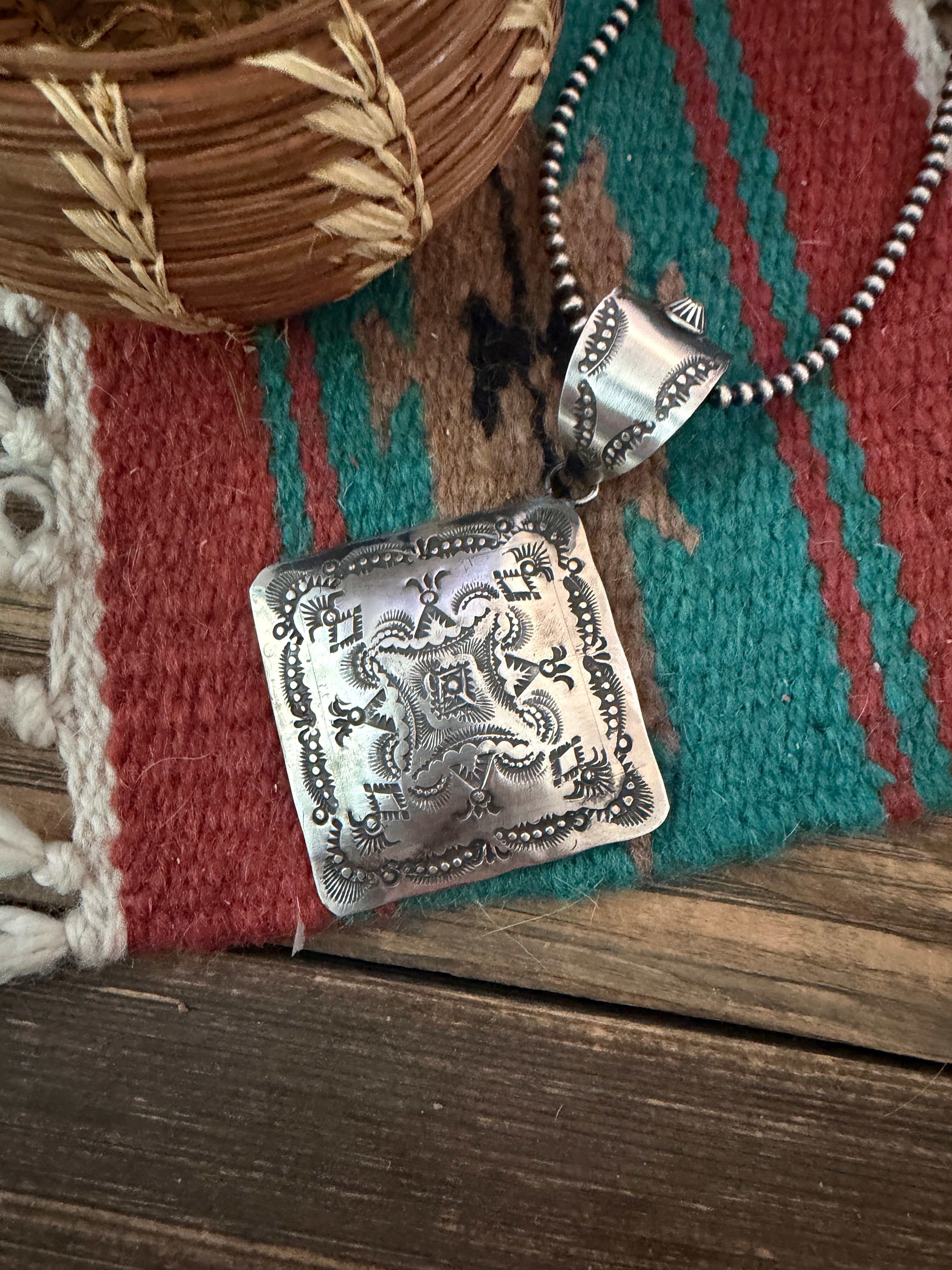 Handcrafted Sterling Silver Concho Pendant by Vincent Platero