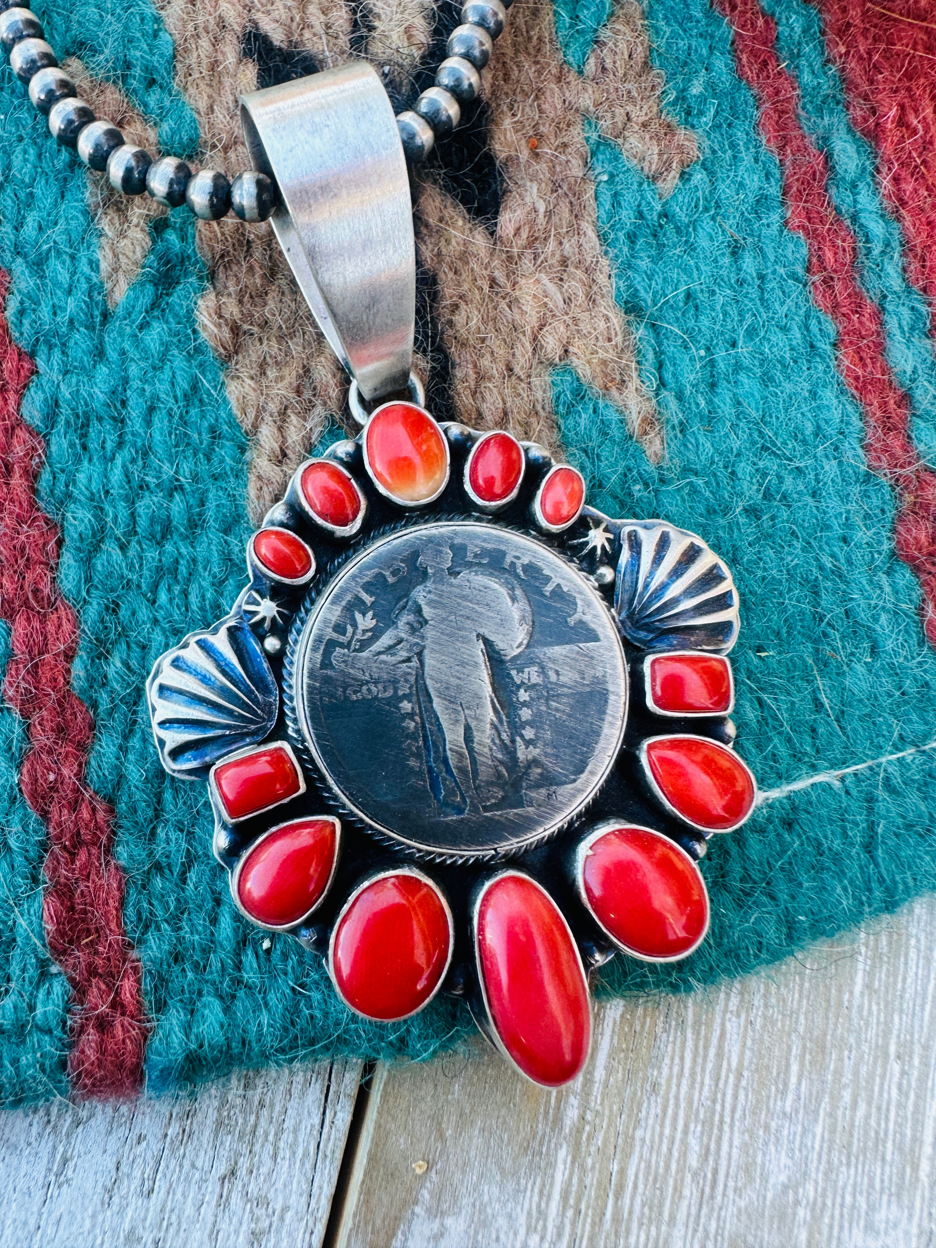 Handcrafted Sterling Silver and Coral Liberty Coin Pendant by Randy Boyd