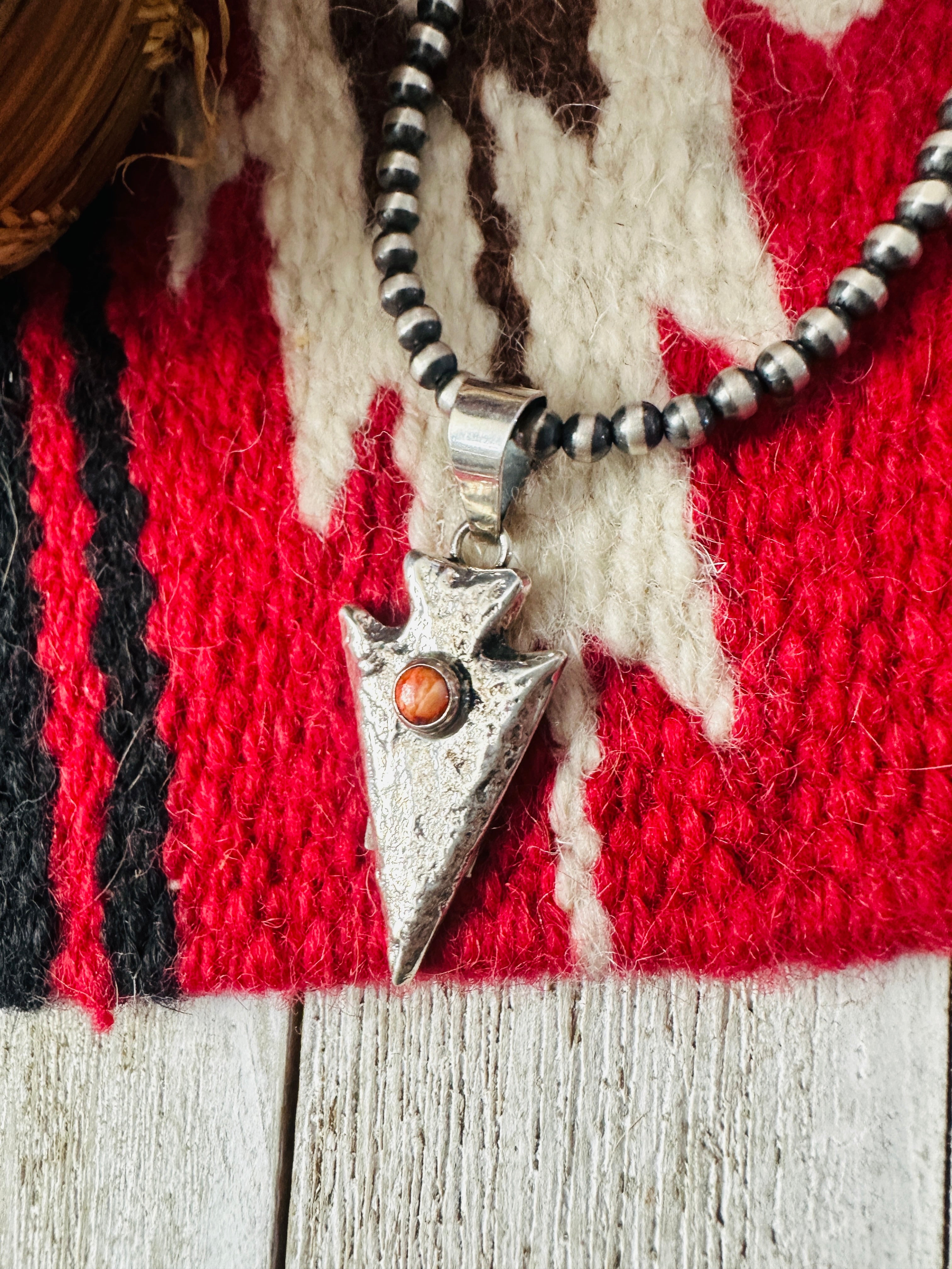 Handcrafted Sterling Silver and Orange Spiny Arrowhead Pendant by Charles Johnson