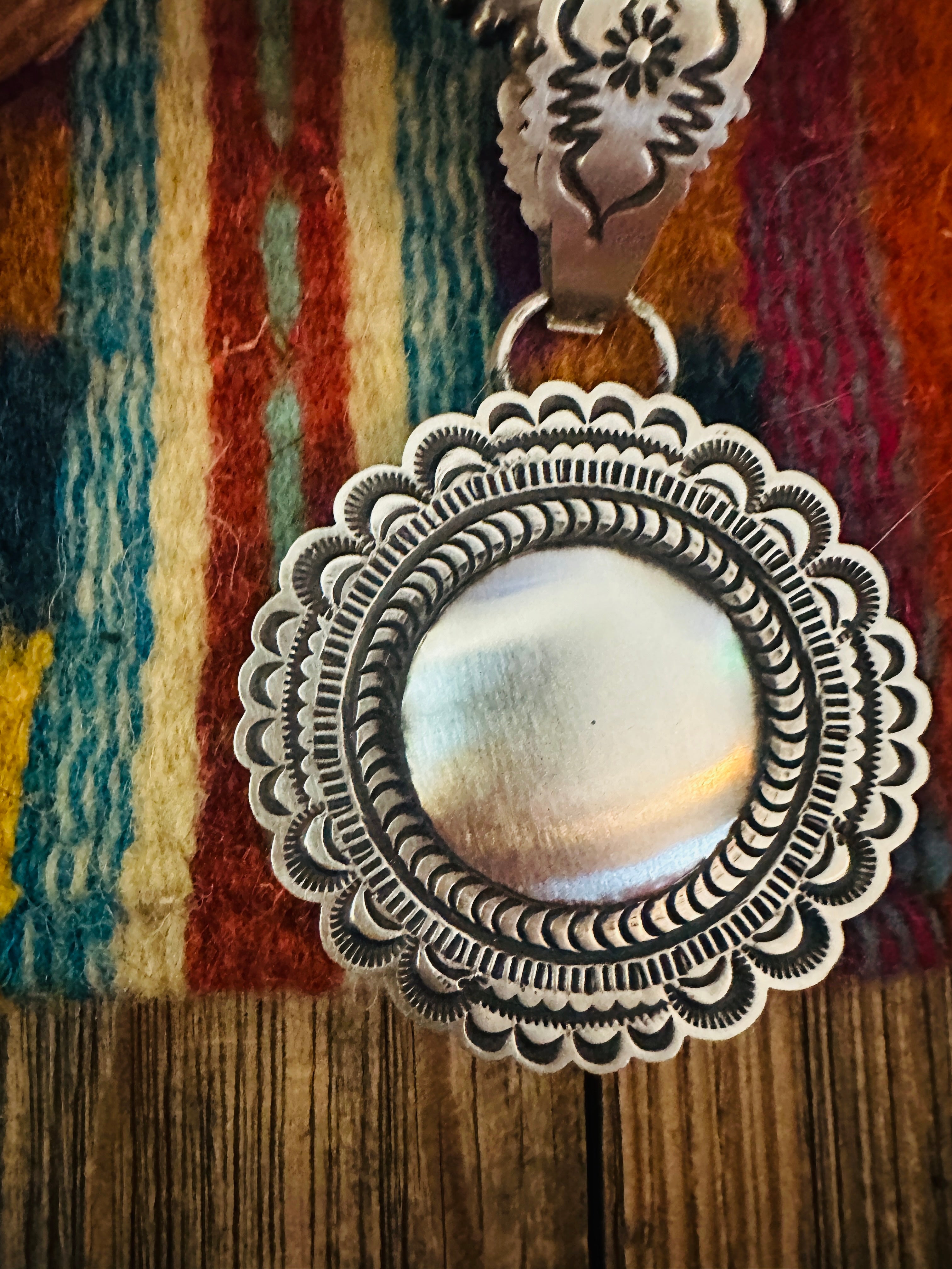 Handcrafted Sterling Silver Concho Pendant by Leander Tahe