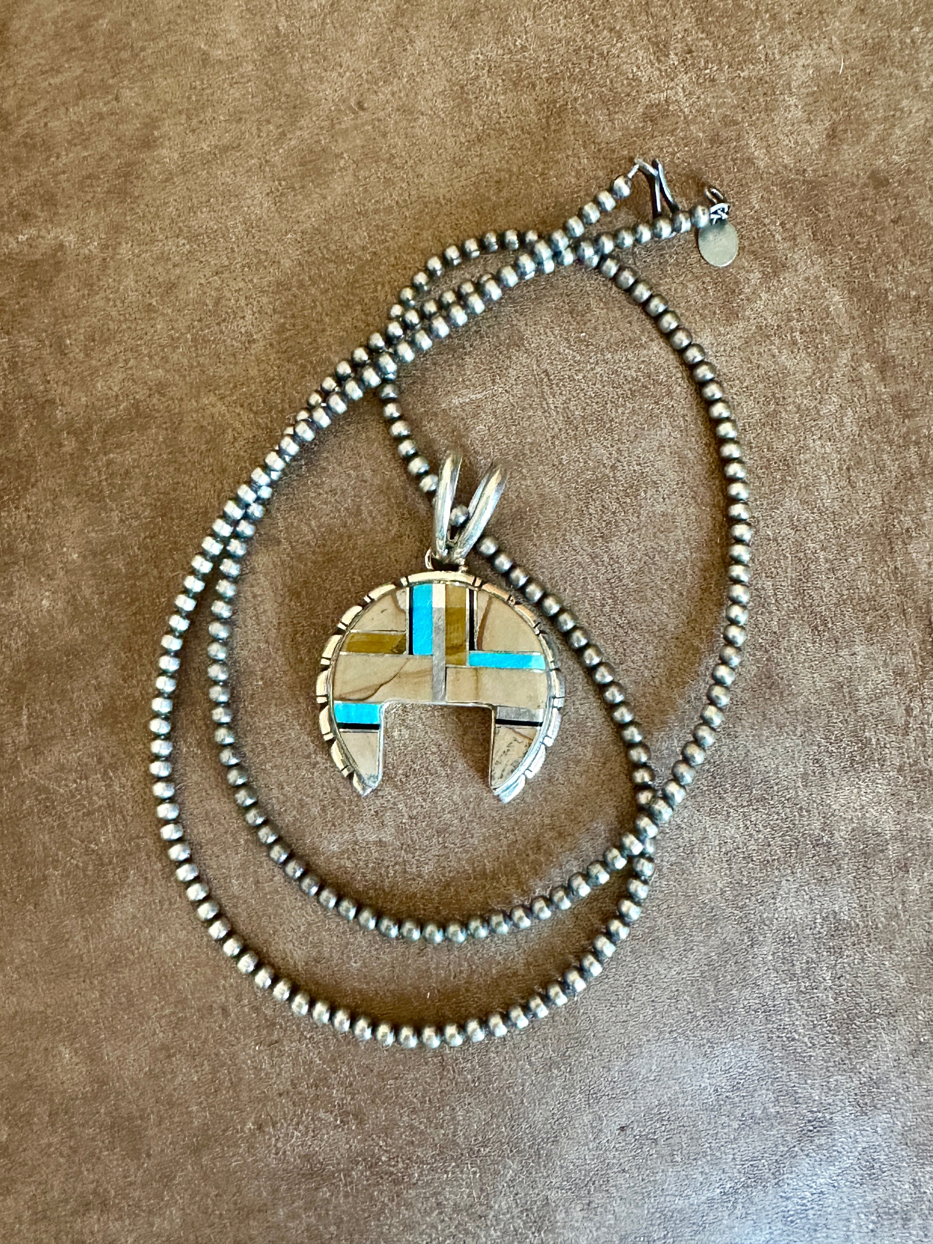 Handcrafted Turquoise, Onyx, Petrified Wood Naja Pendant