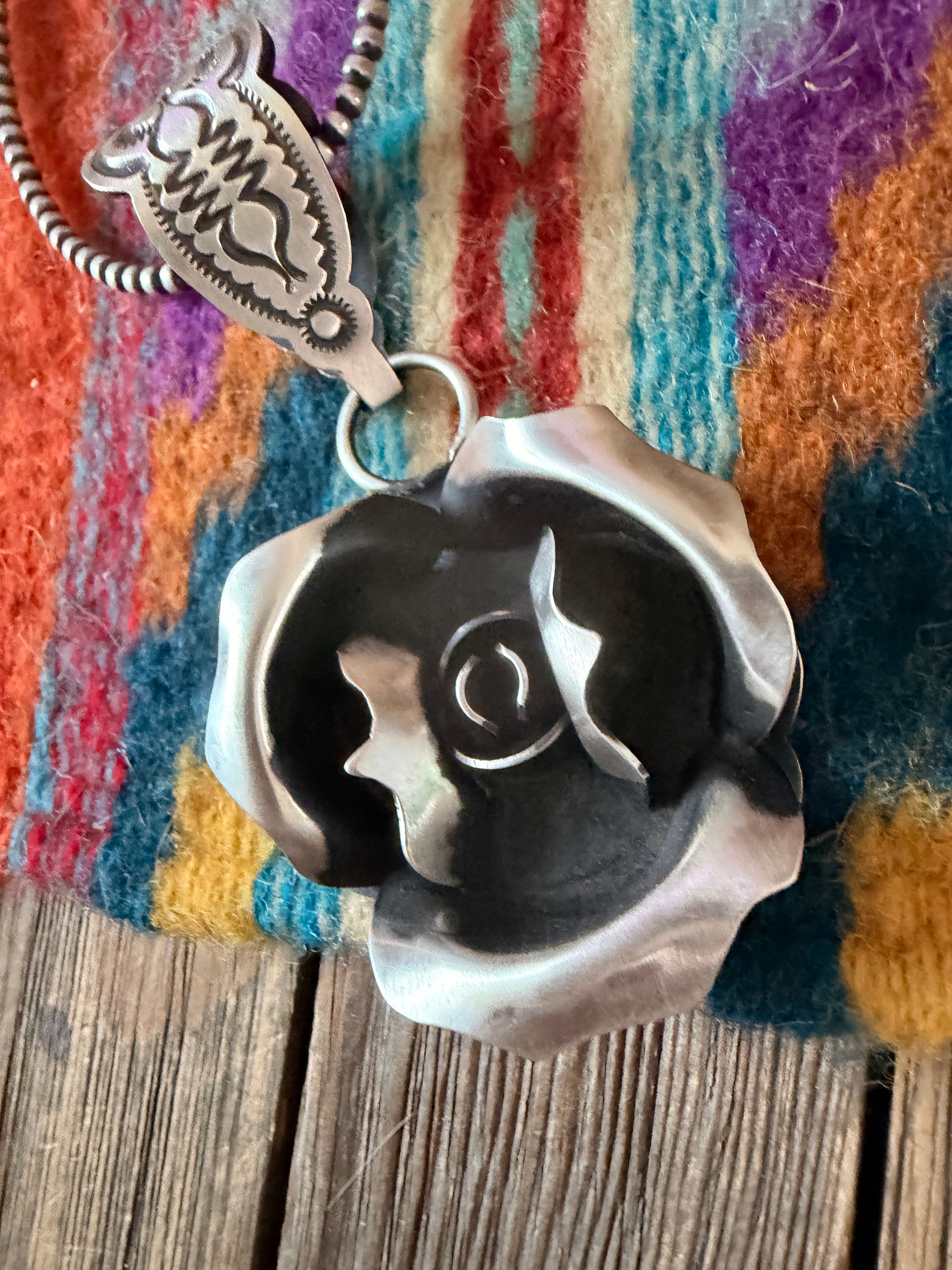 Handcrafted Sterling Silver Rose Pendant by Leander Tahe