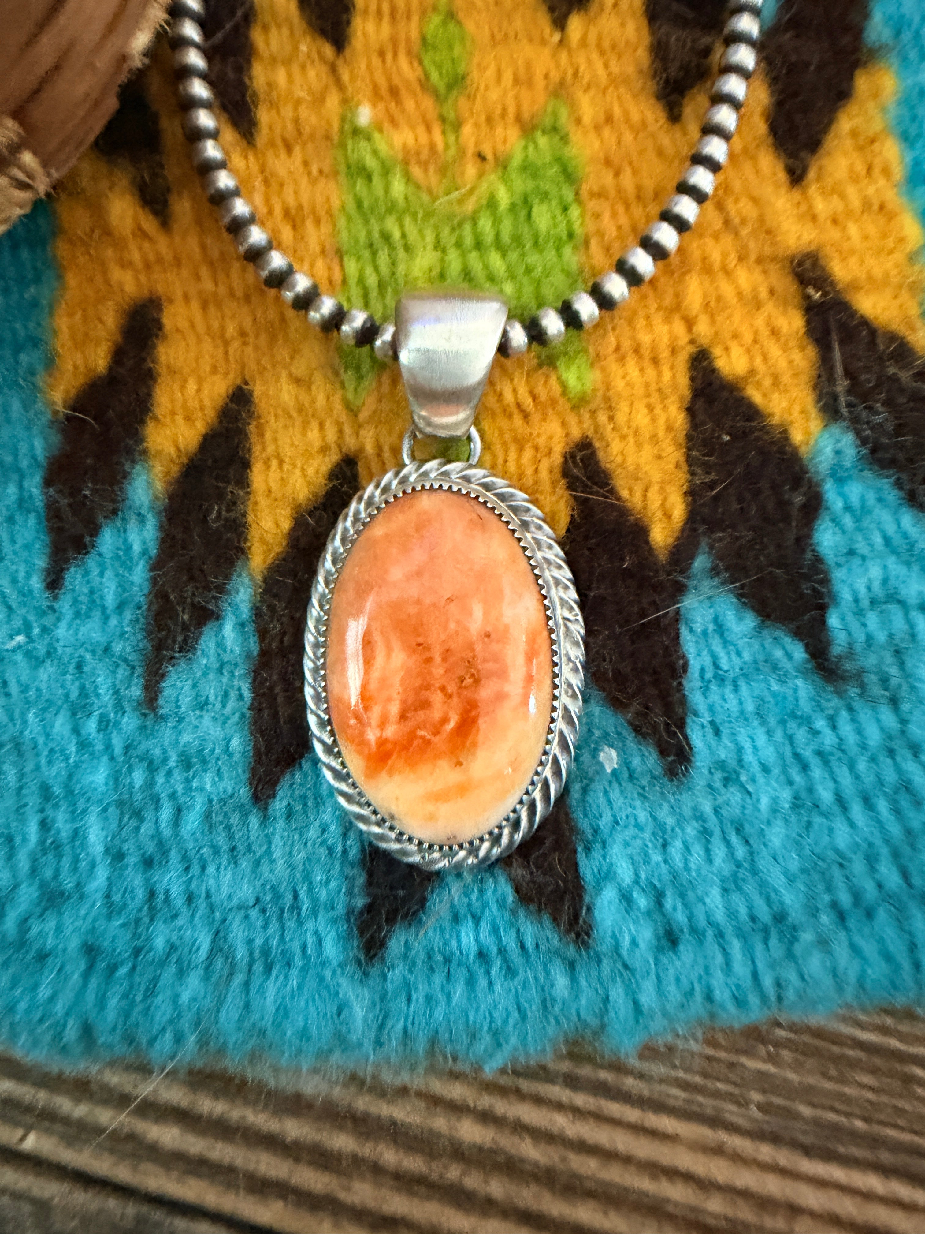 Handcrafted Sterling Silver and Spiny Oyster Pendant