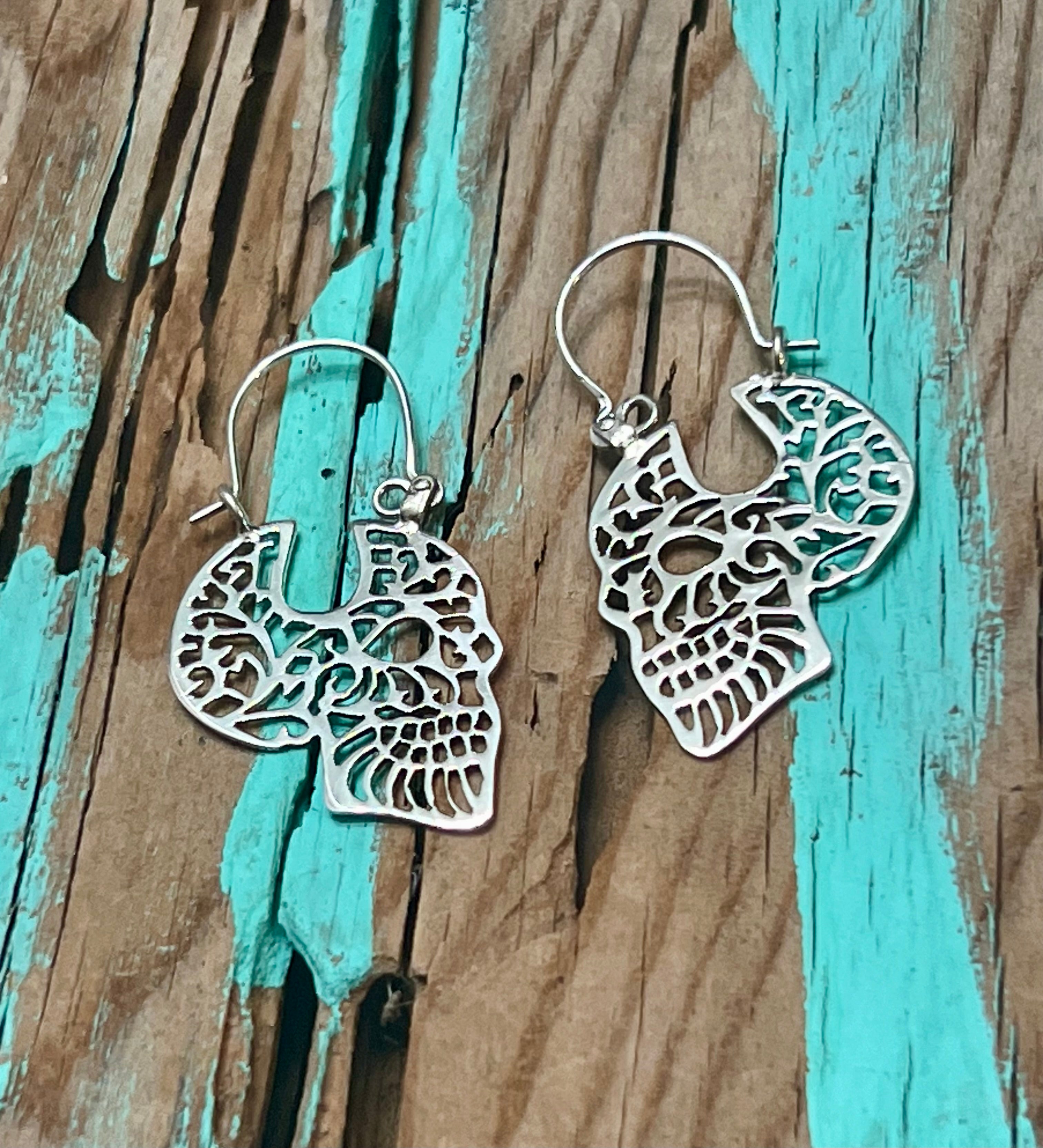 Pierced Skull Profile Sterling Silver Earrings