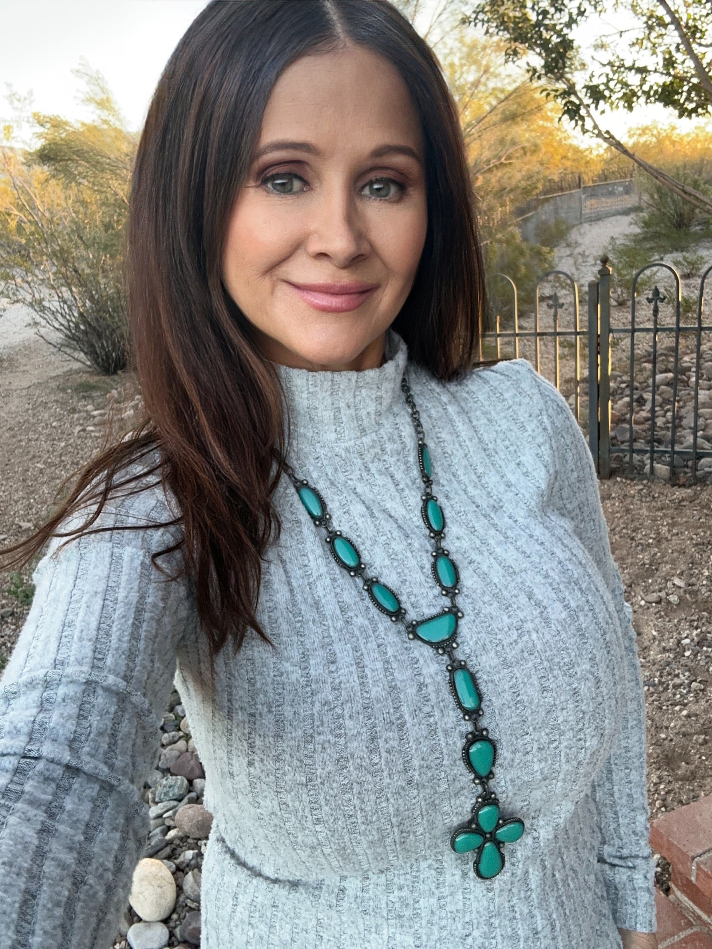 Turquoise Colored Tree Sap Cross Necklace