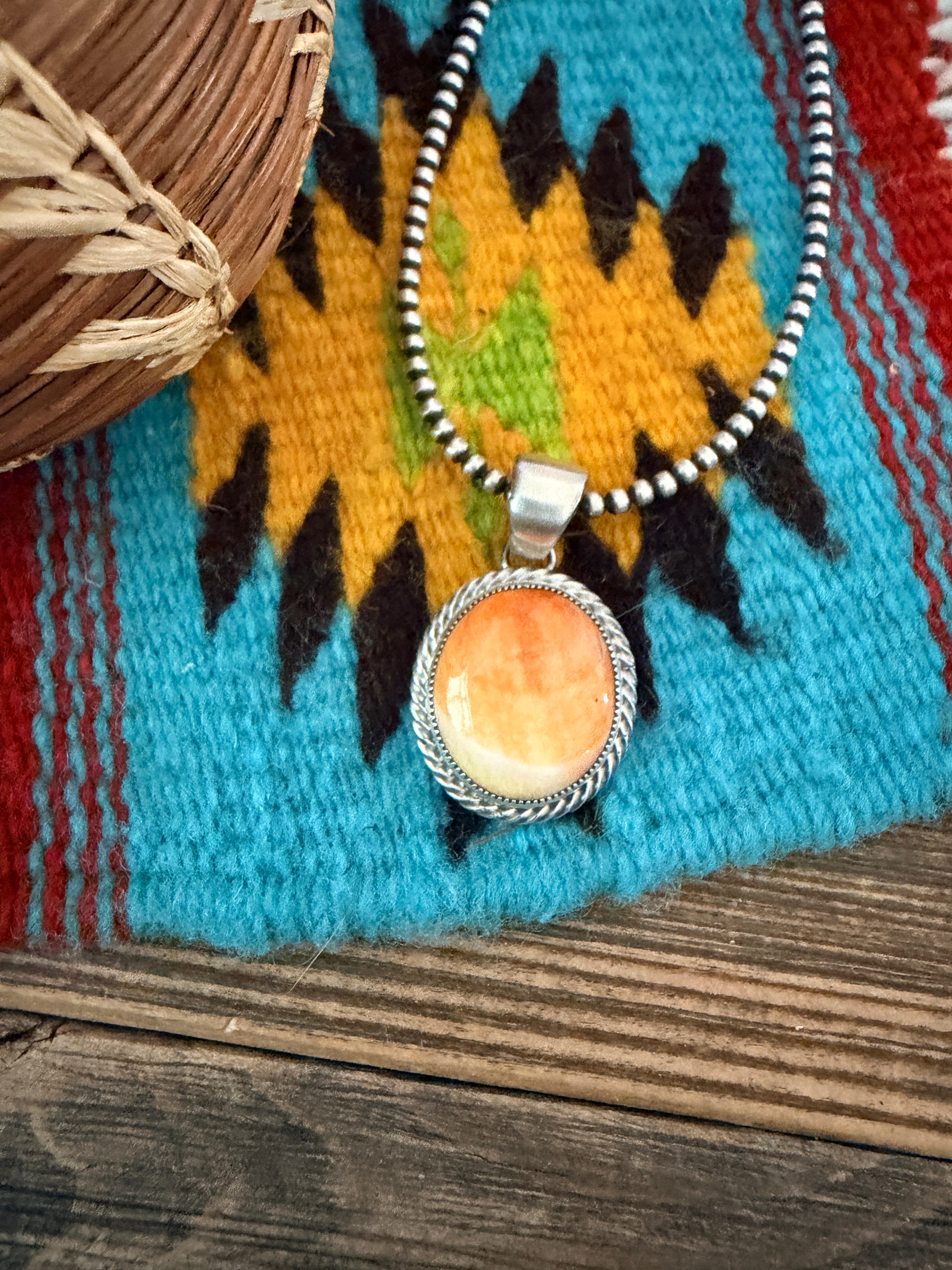 Handcrafted Sterling Silver and Spiny Oyster Pendant