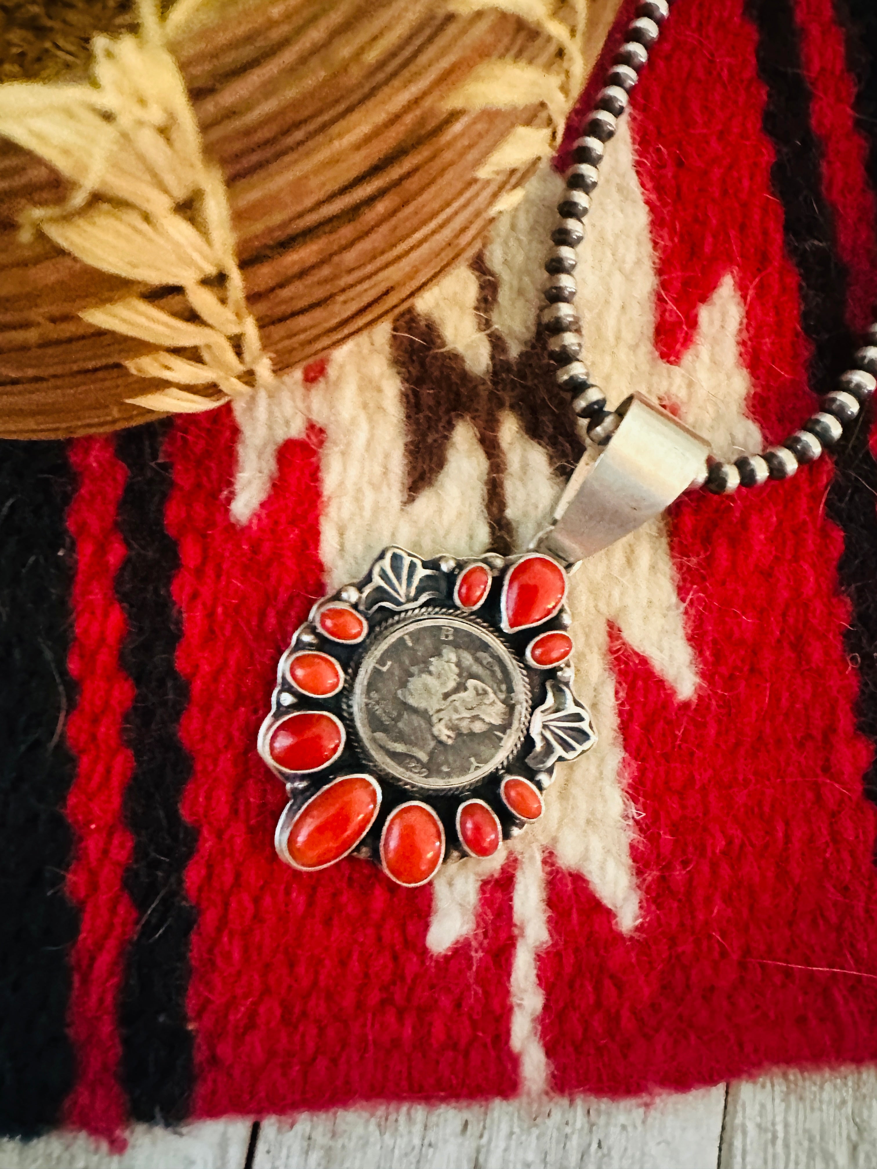 Handcrafted Sterling Silver and Coral Liberty Coin Pendant by Randy Boyd